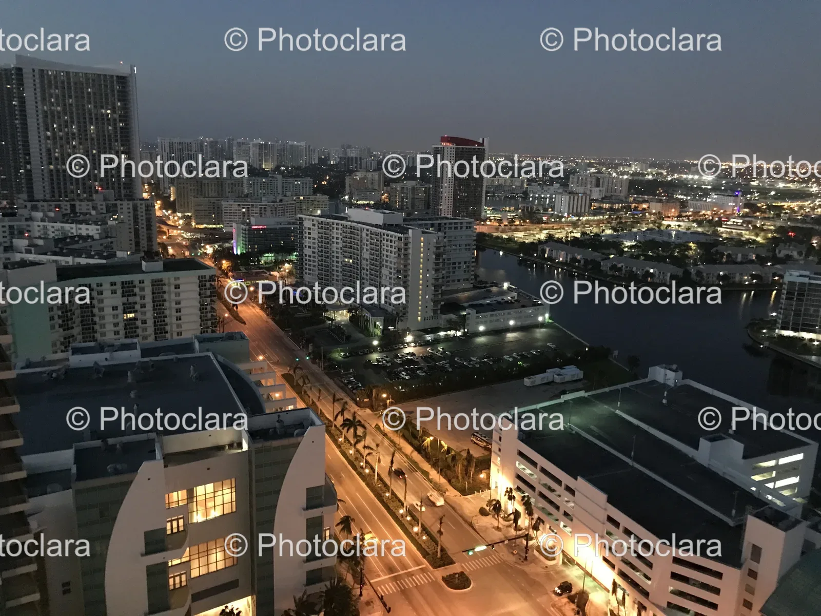 stunning-cityscape-at-night-reflective-river.jpg