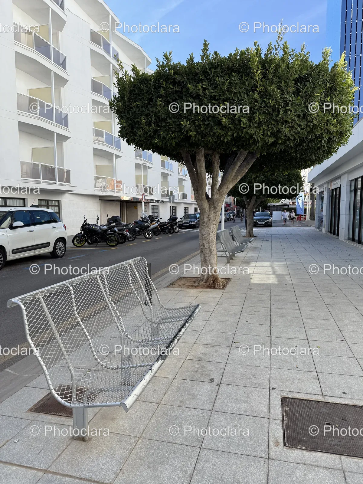 Charming-Sidewalk-with-Benches.jpg