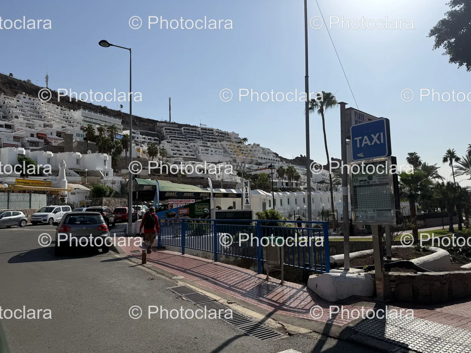 Bustling-Urban-Street-with-Cars-and-Buildings.jpg