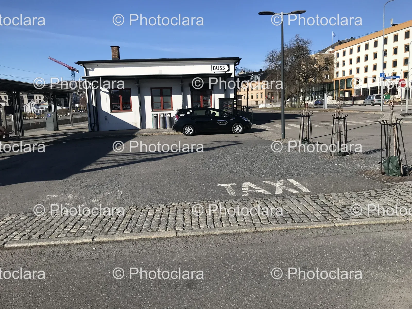 Building-with-Black-Car-Parked-in-Front.jpg