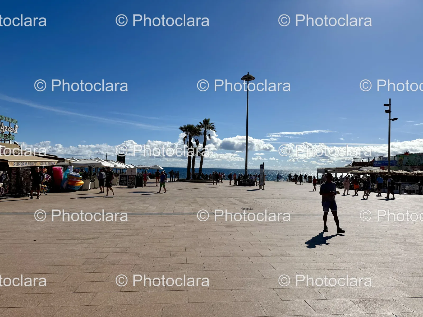 People-Strolling-on-Urban-Sidewalk.jpg