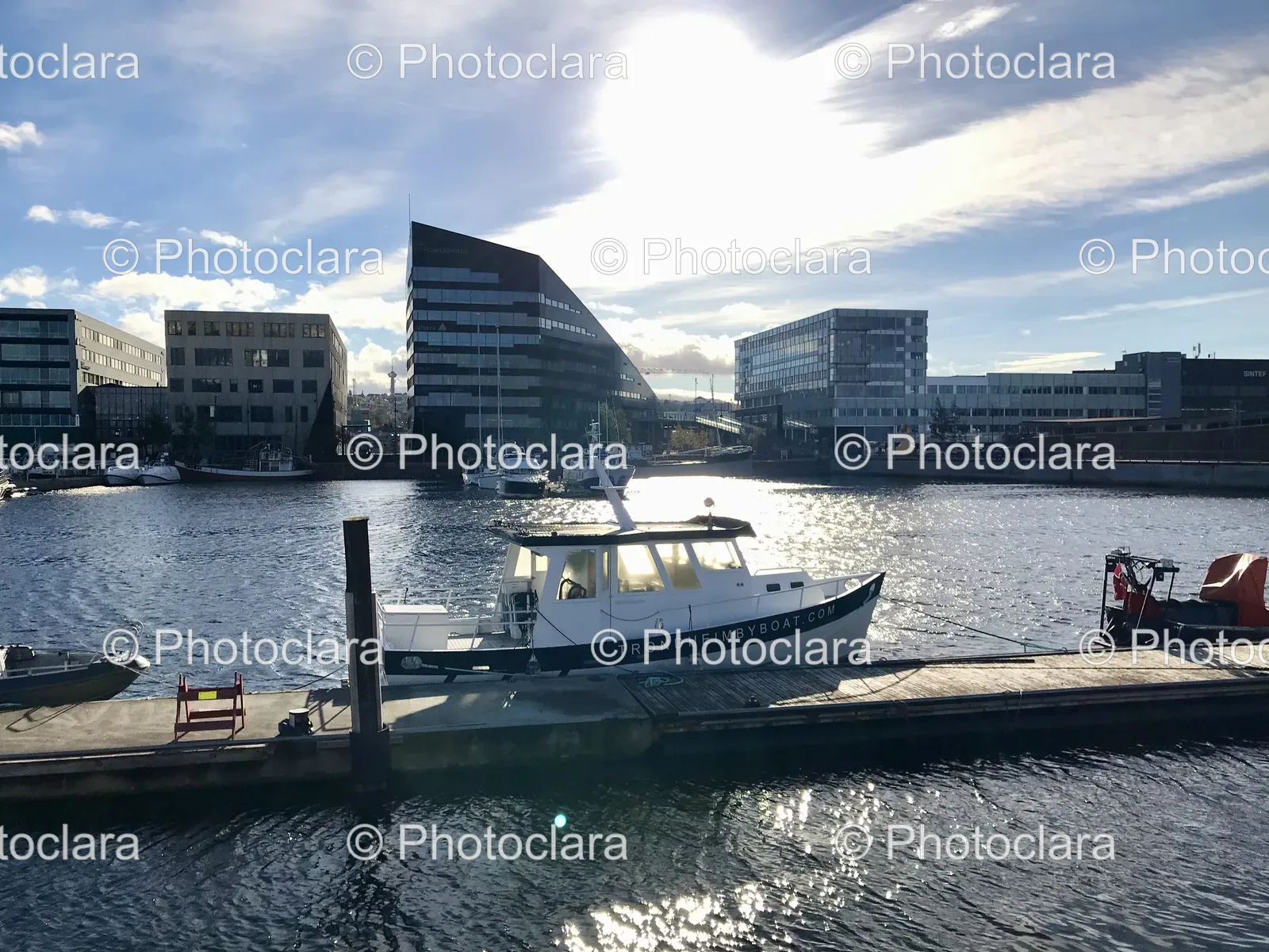 Boat-Docked-at-City-Waterfront.jpg