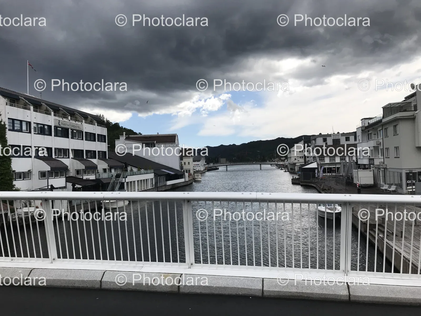 Bridge-Over-River-With-City-Buildings.jpg