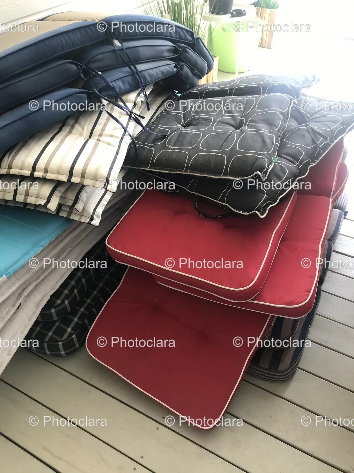 stack-of-cushions-on-wood-floor.jpg