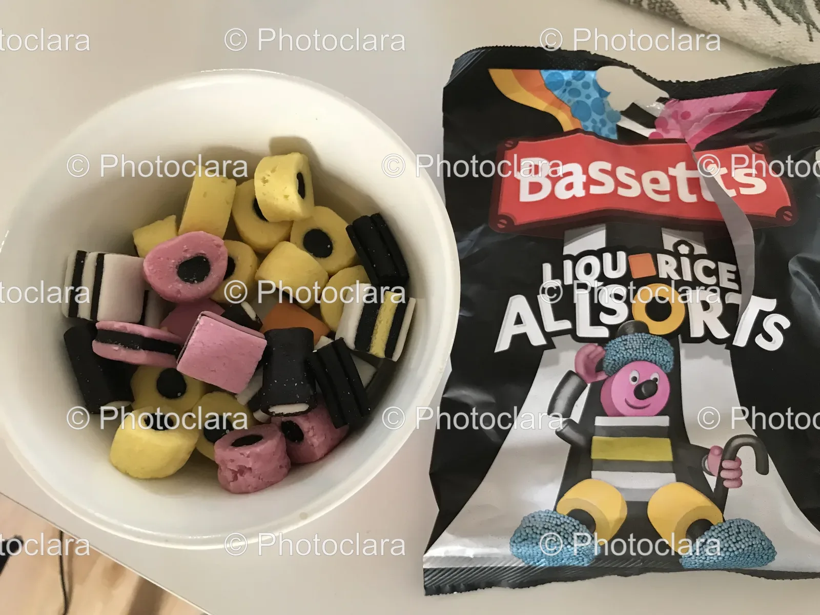 bowl-of-candy-next-to-bag-of-bassetts-allsorts.jpg