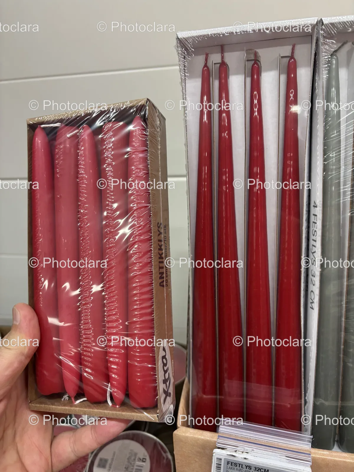 Hand-Holding-Box-of-Red-Festlys-Candles.jpg