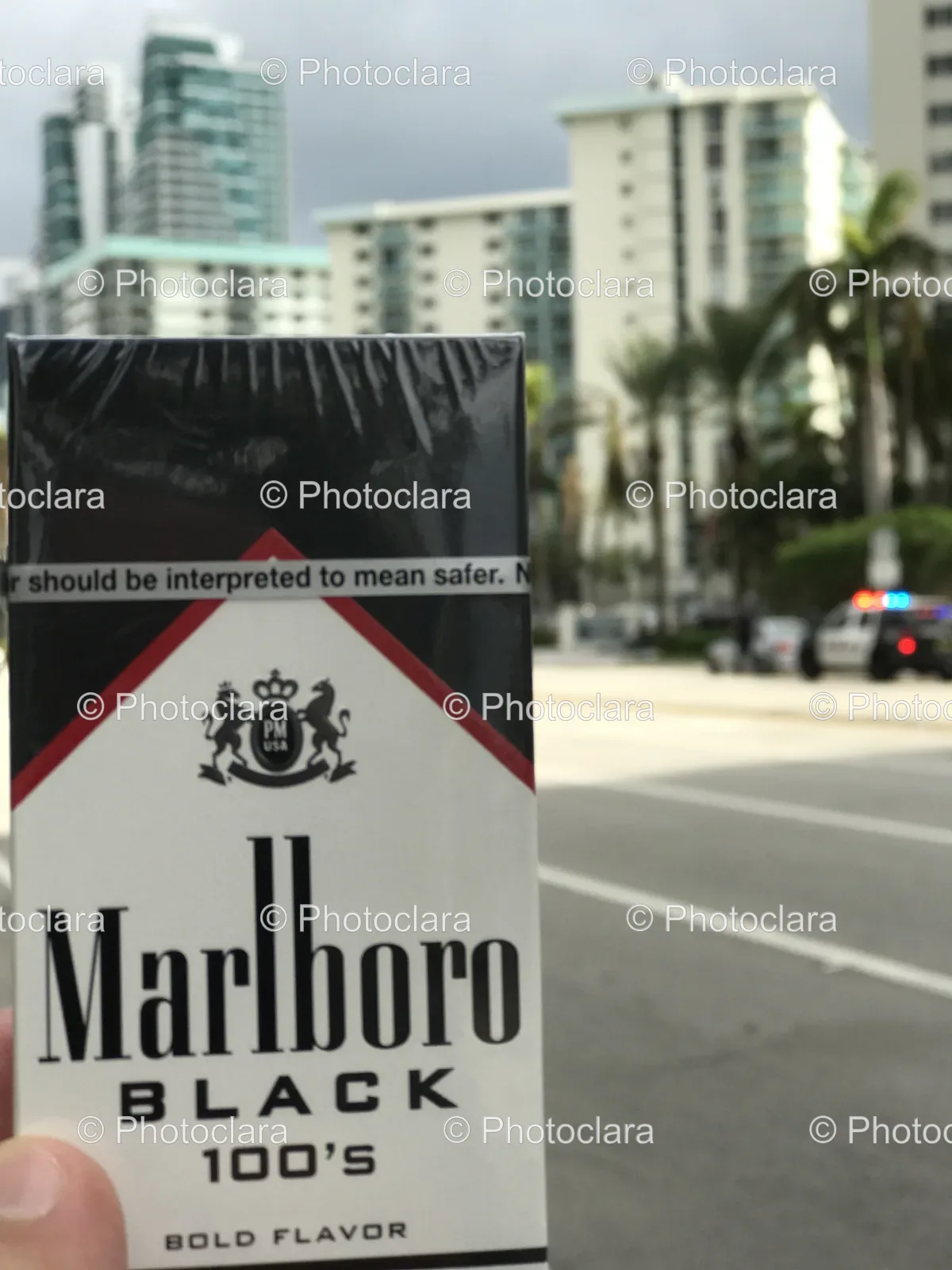 hand-holding-pack-of-marlboro-cigarettes.jpg