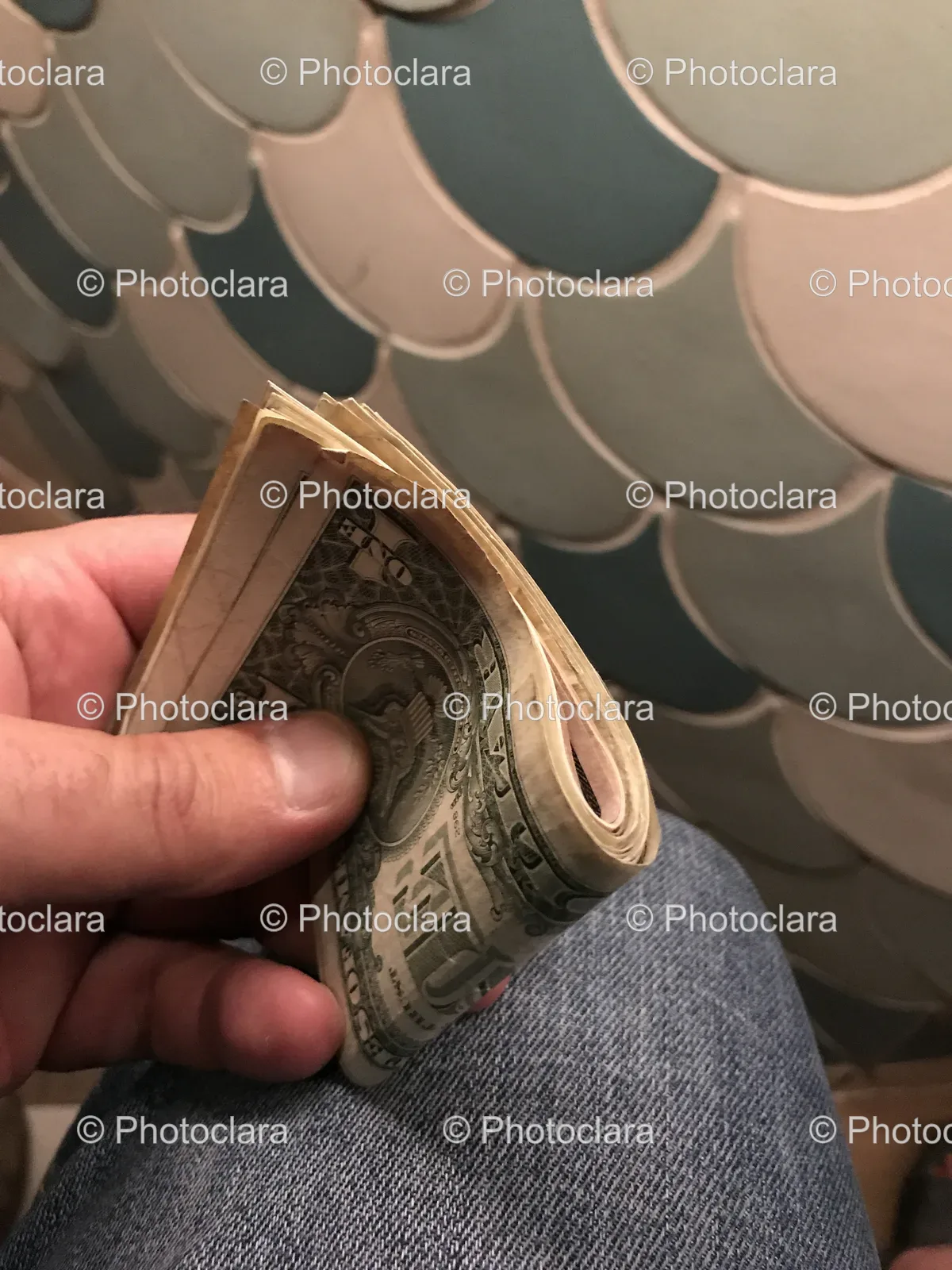 Hand-Holding-Stack-of-Money.jpg