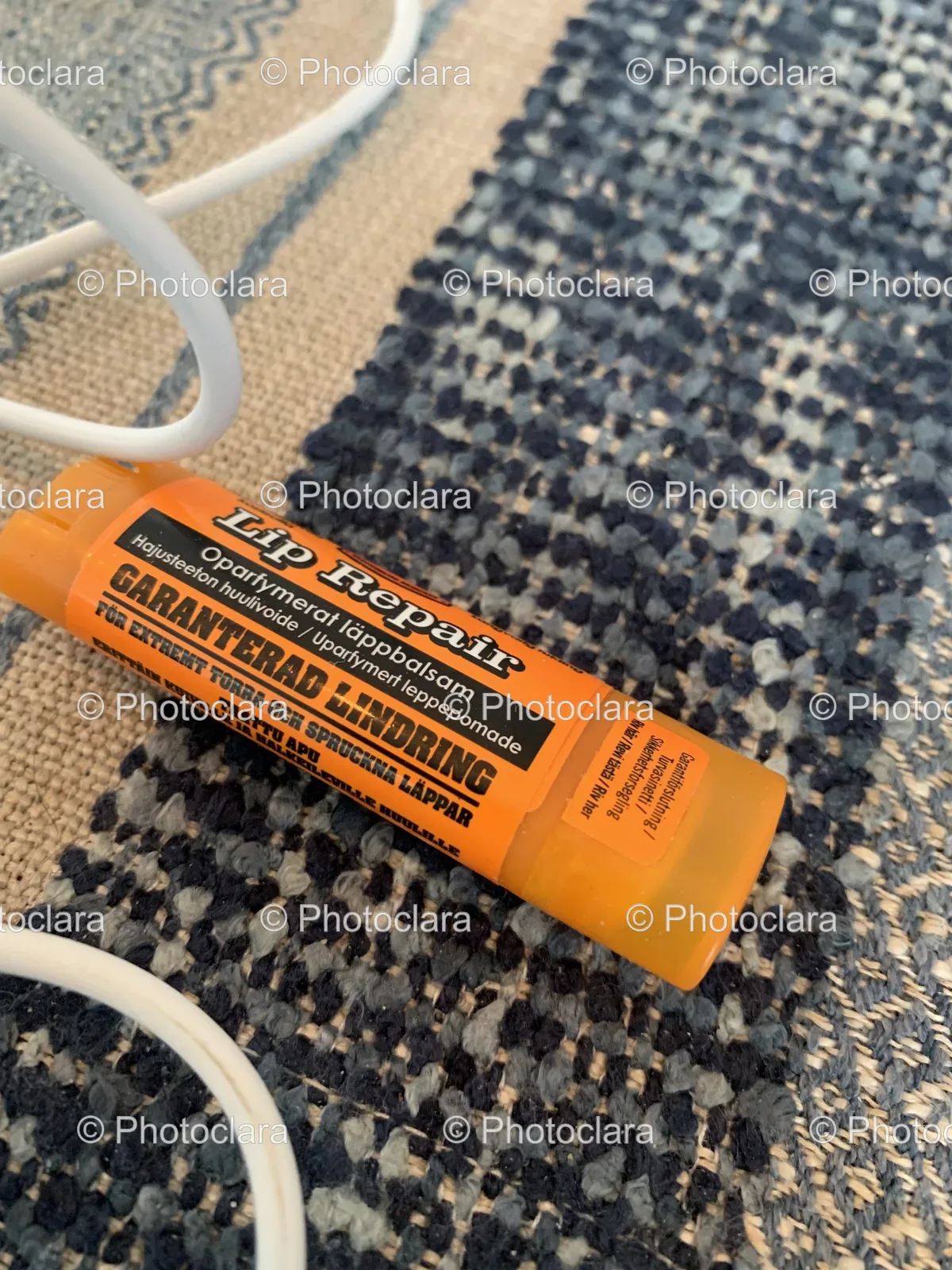 Compact-Orange-Lip-Balm-Multiple-Languages.jpg