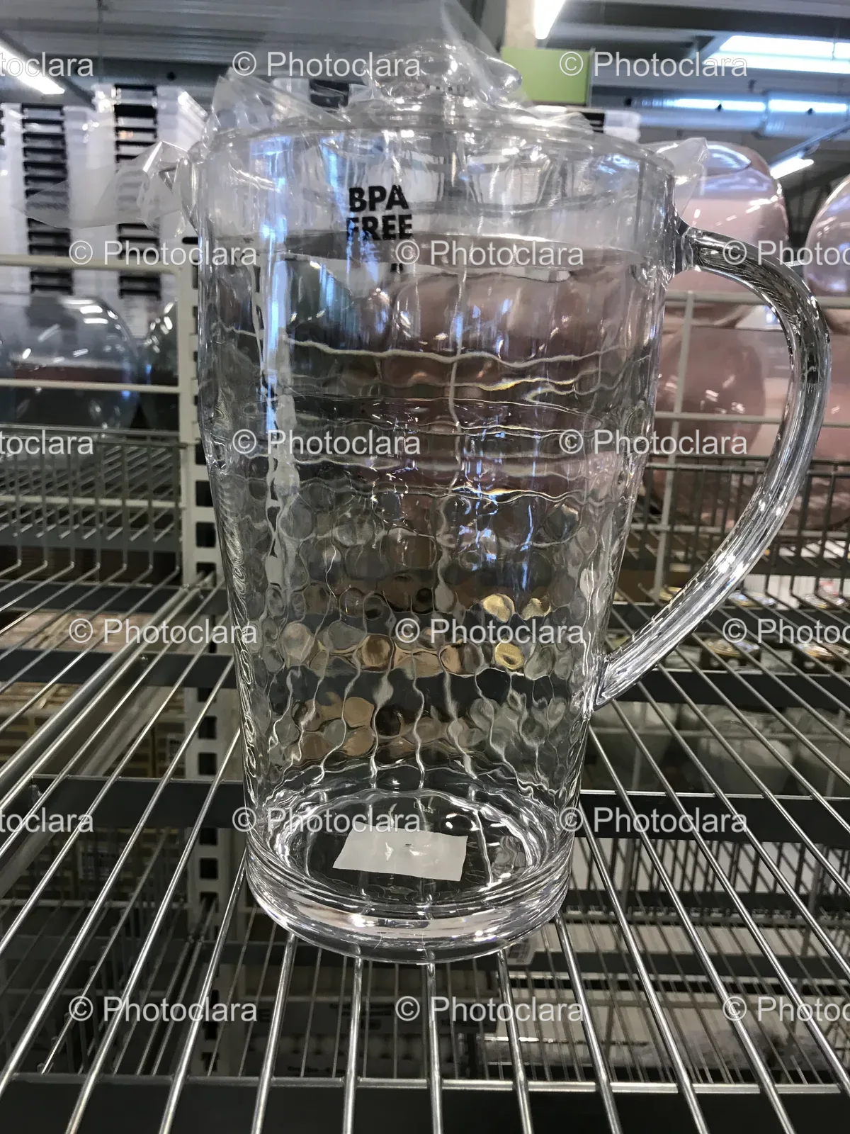 Clear-Glass-Pitcher-on-Metal-Shelf.jpg