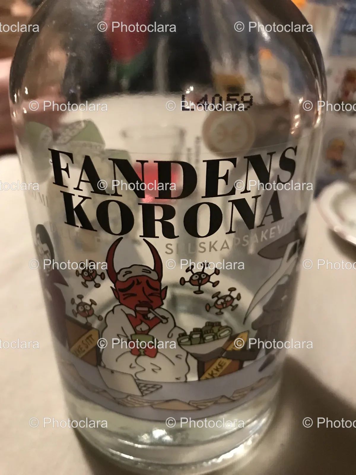 Fandens-Korona-Glass-Bottle-with-Intricate-Text.jpg