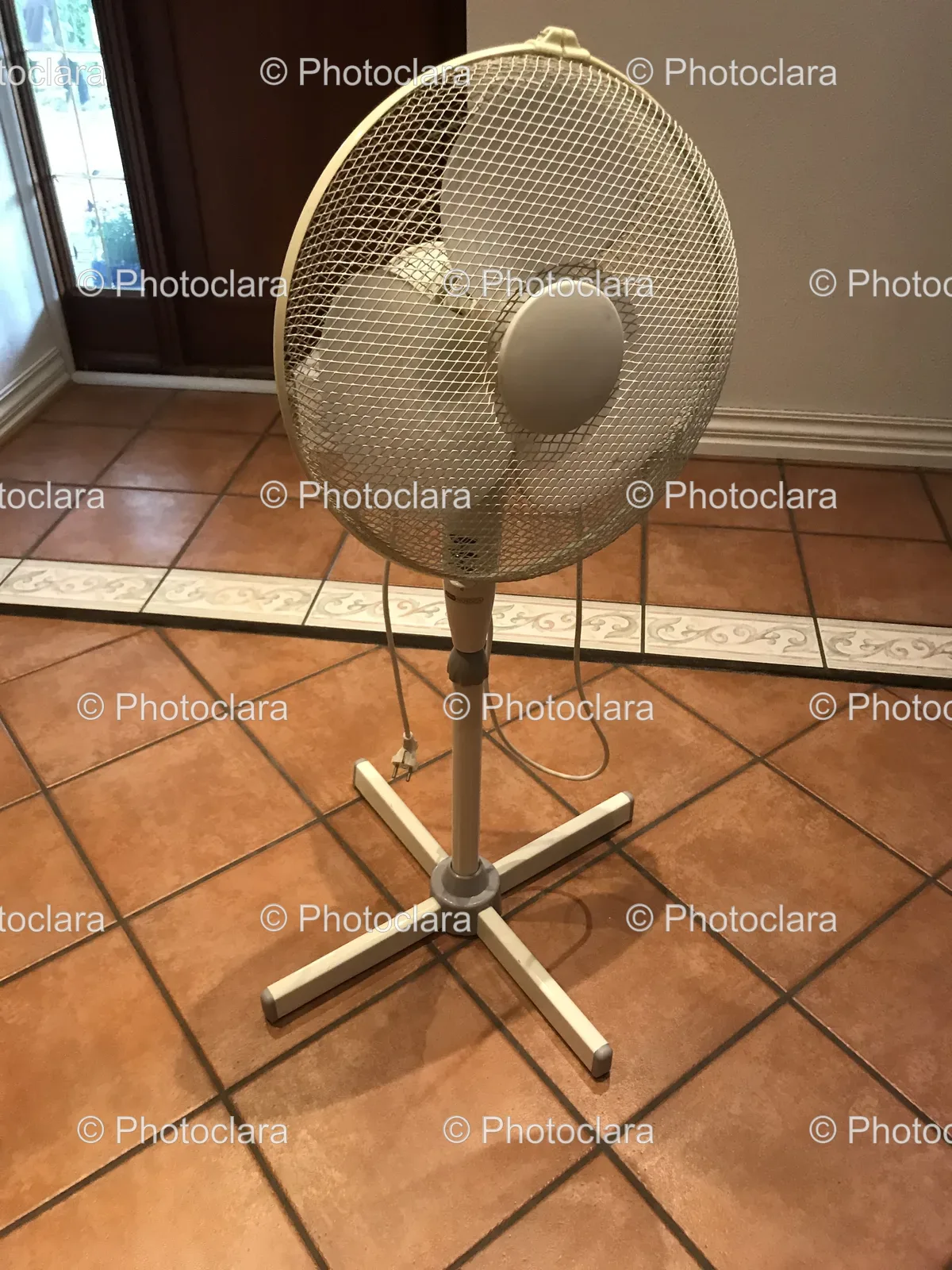 Electric-Fan-On-Tile-Floor.jpg