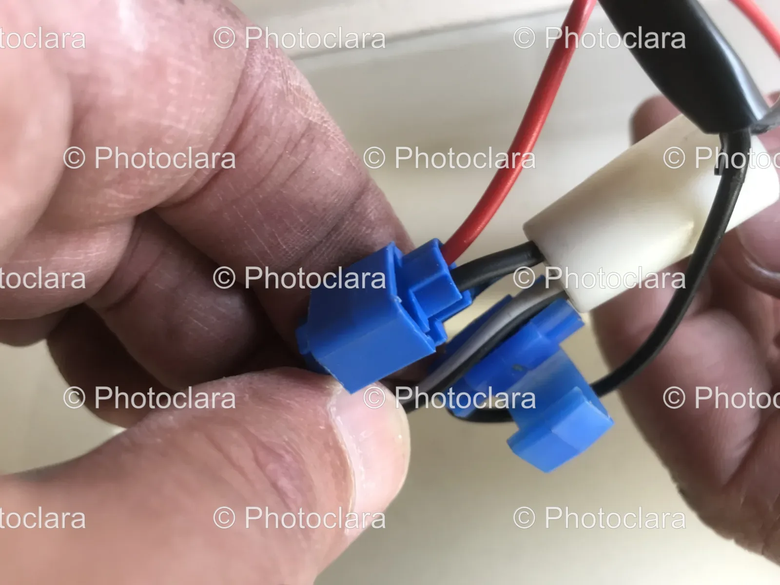 Person-Handling-Electrical-Wires.jpg