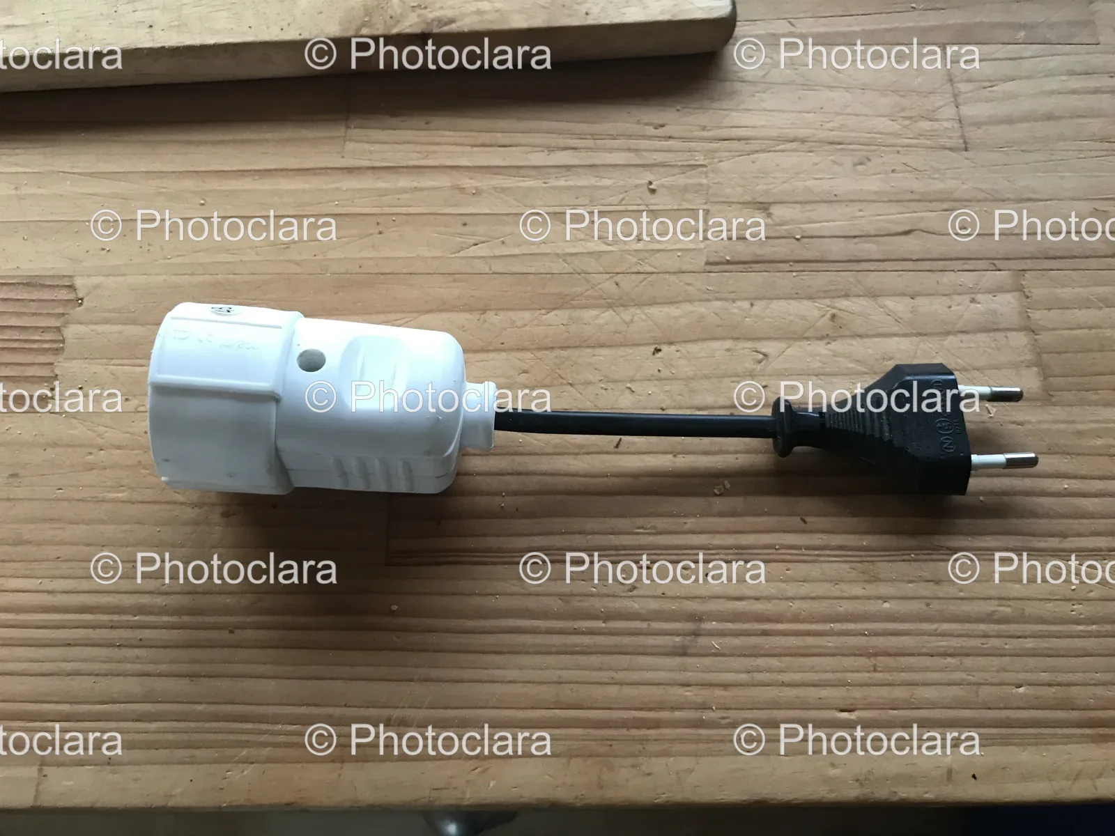 White-Plug-with-Black-Cord.jpg