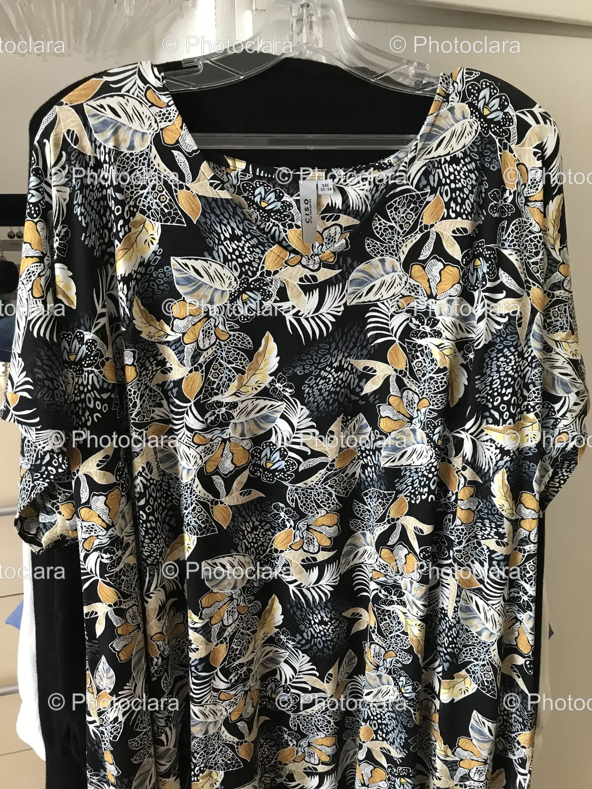 black-and-yellow-shirt-on-hanger.jpg