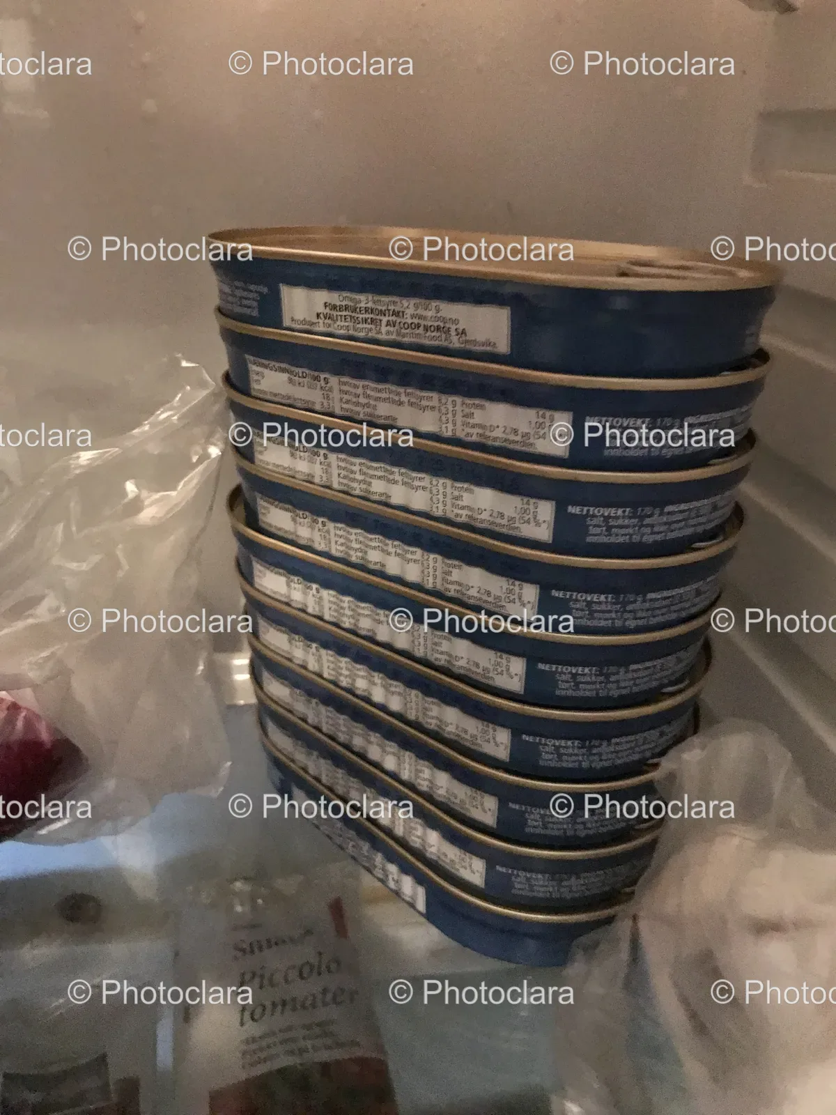 Stack-of-Canned-Food-in-Refrigerator.jpg