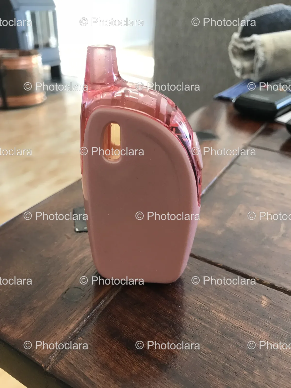 pink-device-on-wooden-table.jpg