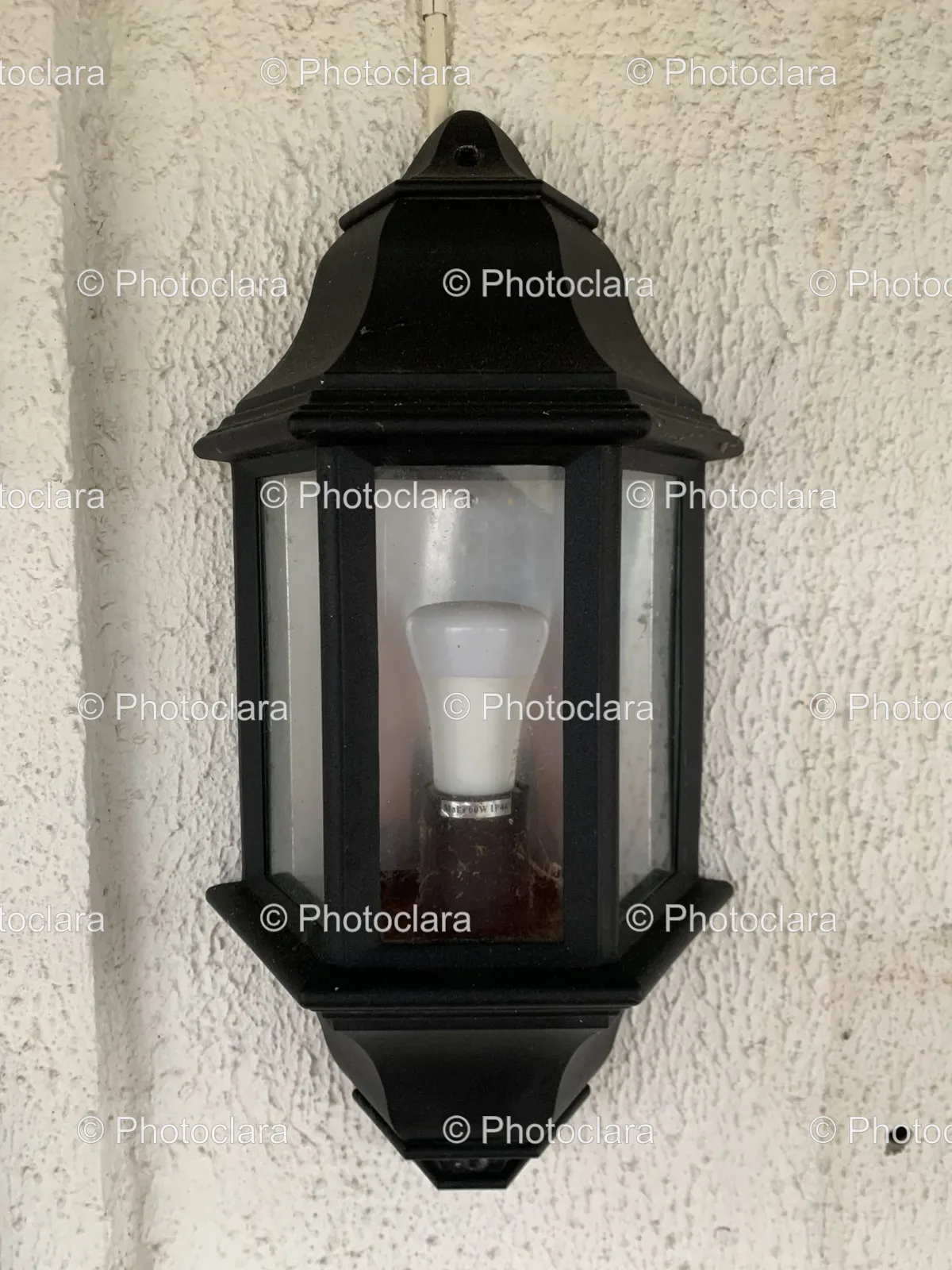 black-lantern-on-white-wall.jpg