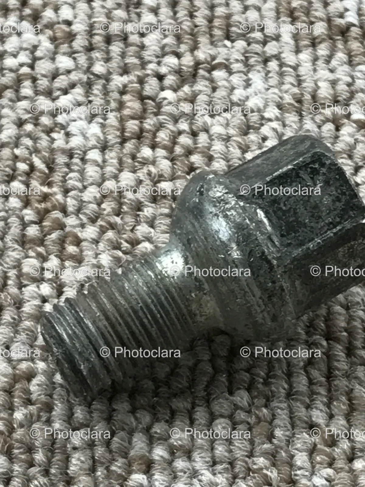 Metal-Bolt-on-Carpet.jpg