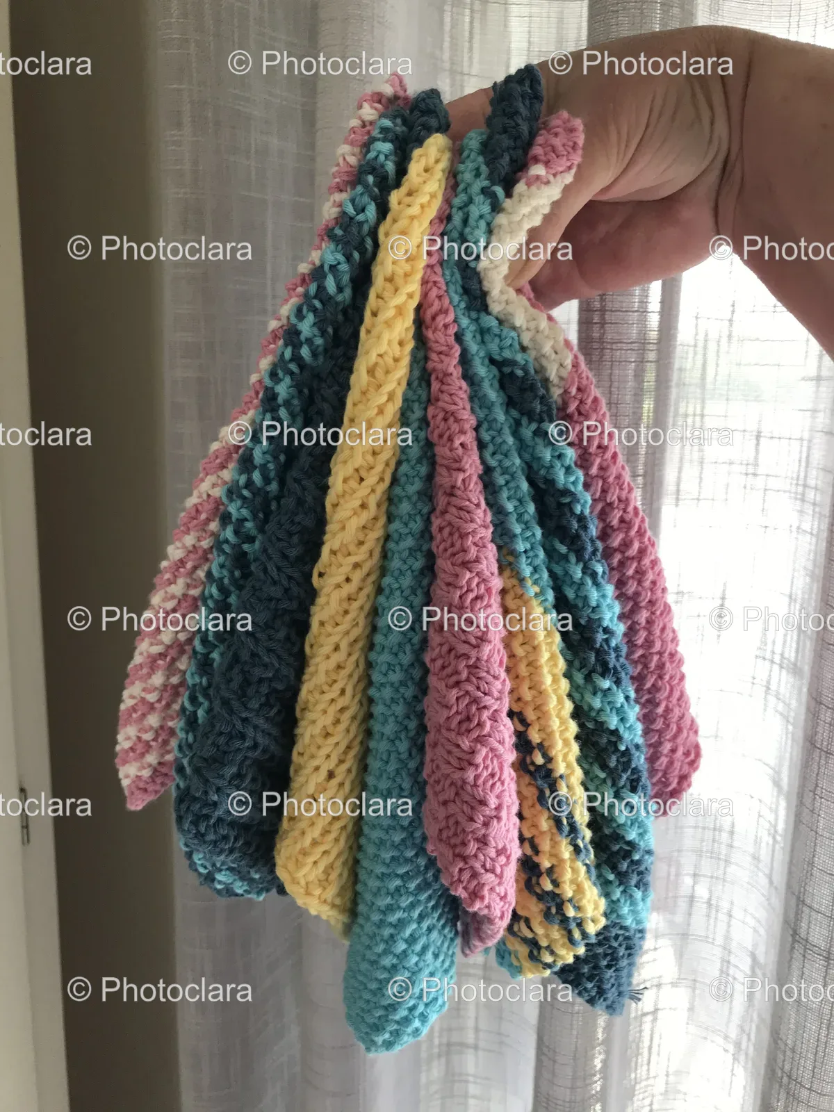 Hand-Holding-Knitted-Blankets.jpg