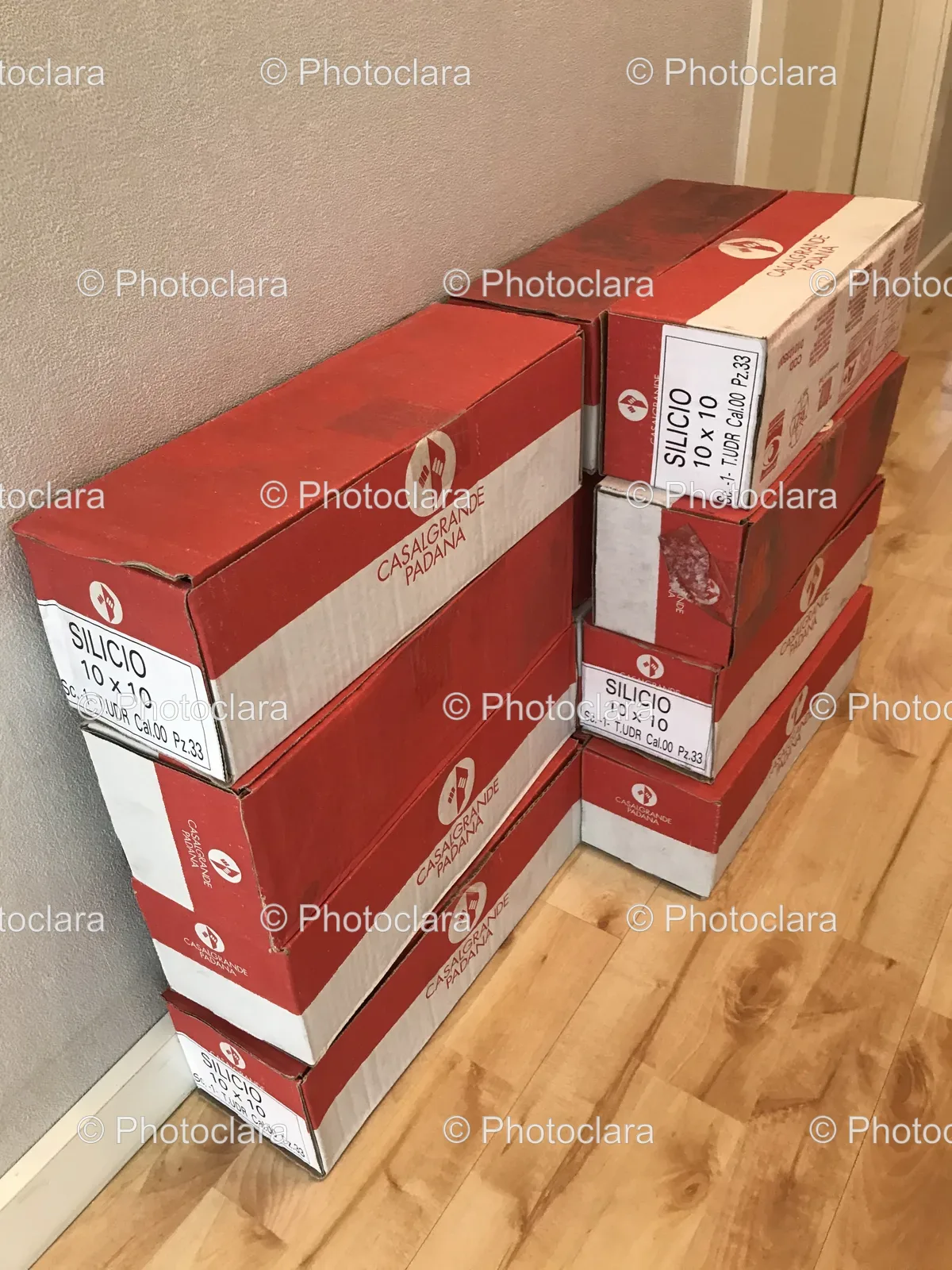 stack-of-boxes-on-wood-floor.jpg