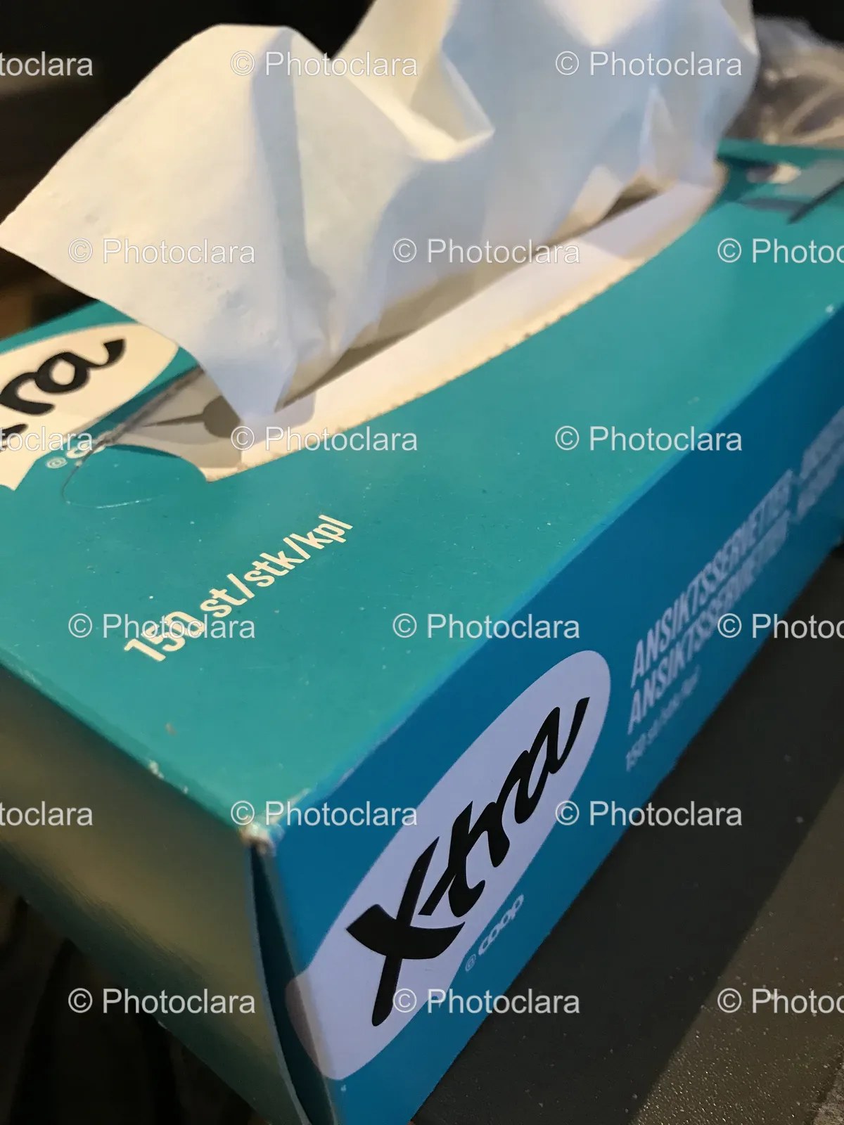 blue-box-with-white-text-and-tissue.jpg