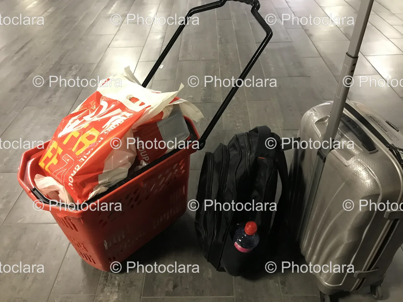 Shopping-Basket-and-Luggage-on-the-Floor.jpg