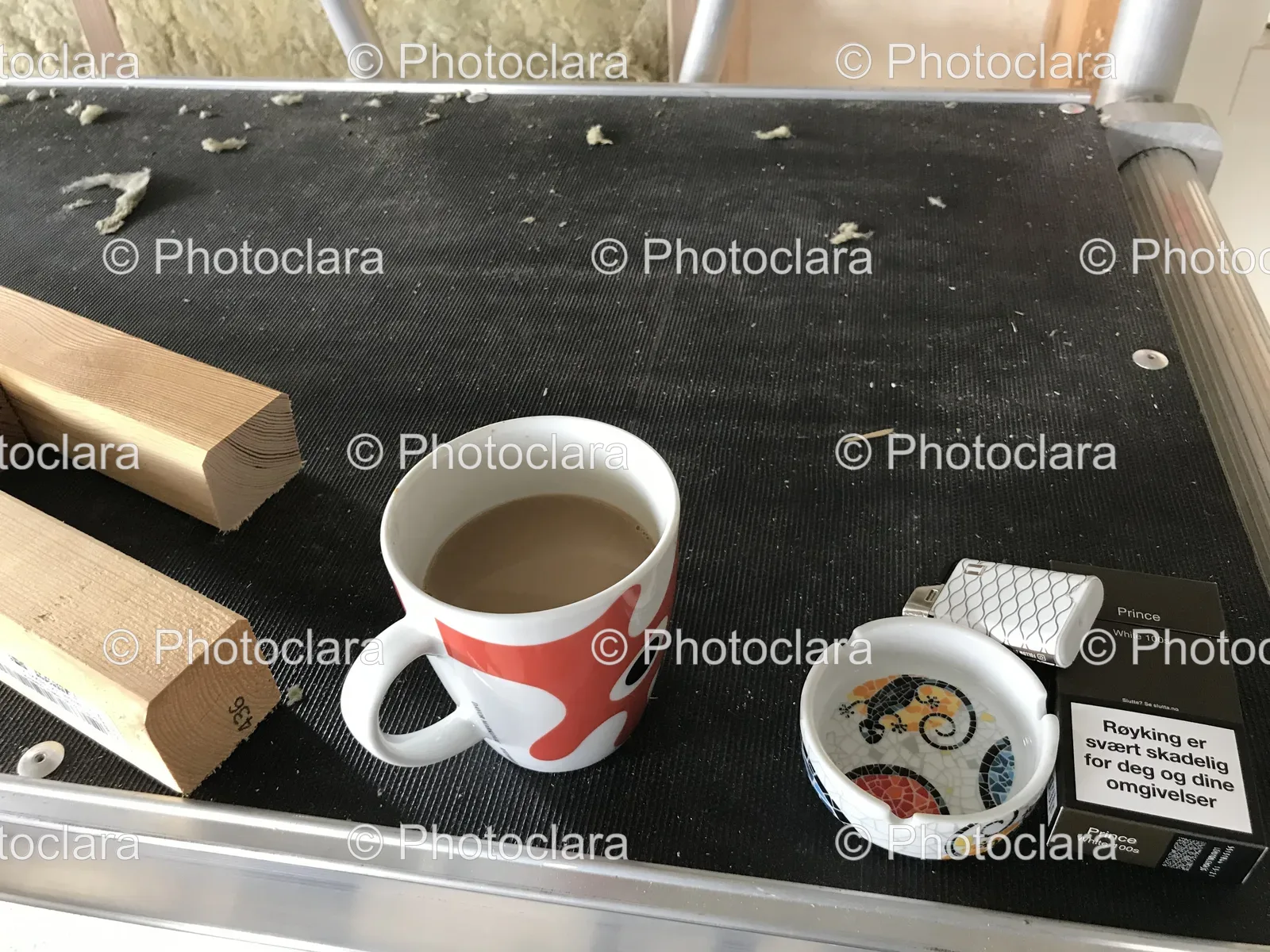 Coffee-Cup-and-Ashtray-on-Table.jpg