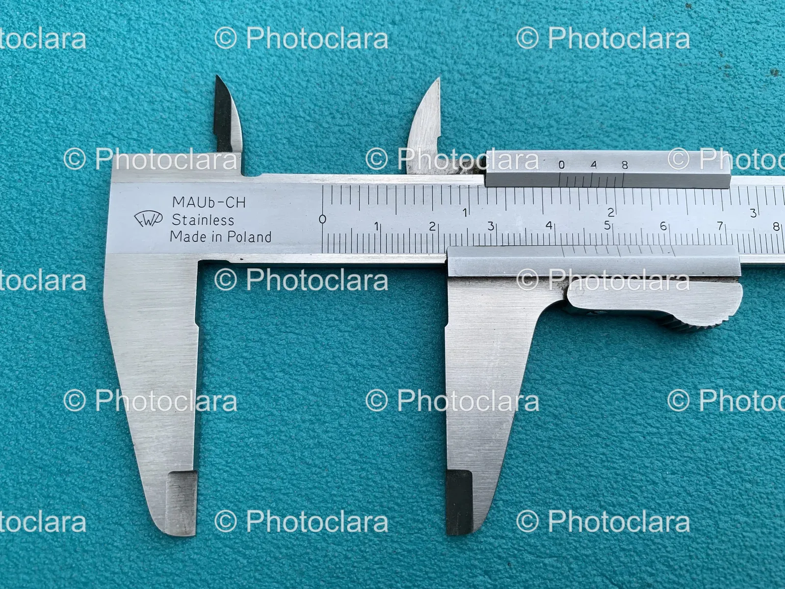 Metal-Caliper-Blue-Surface.jpg