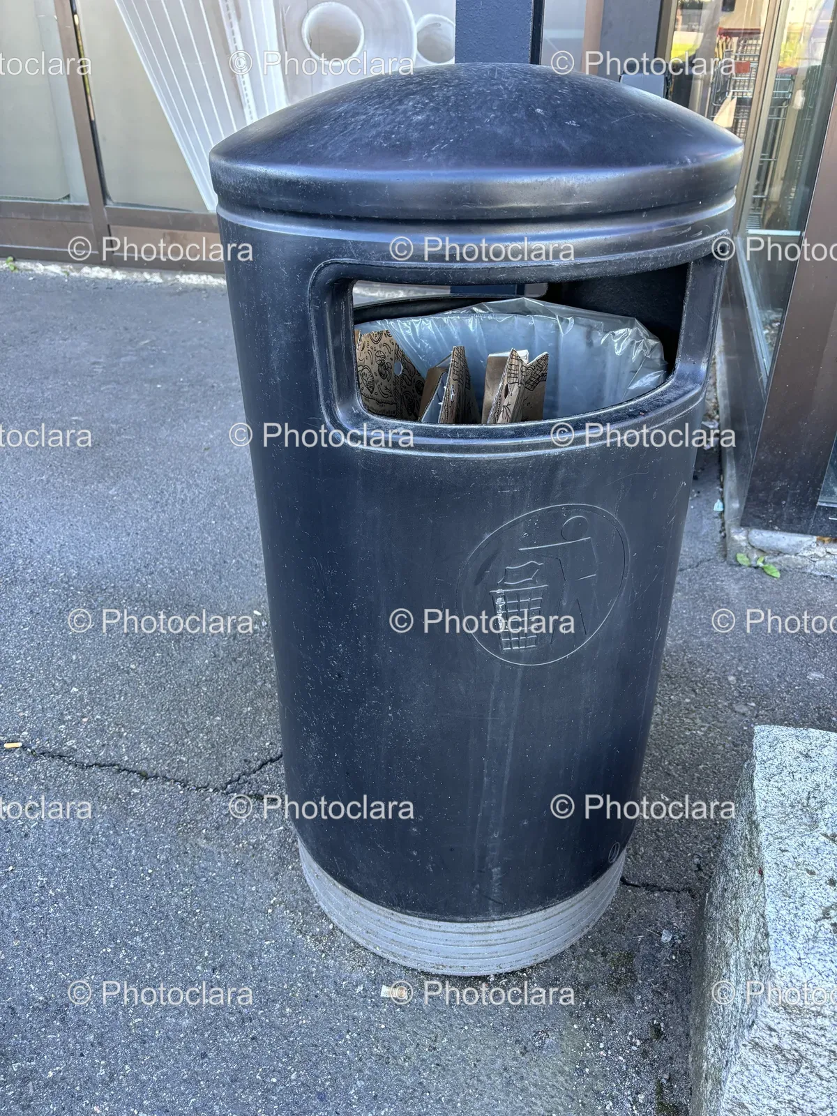 black-trash-can-with-plastic-bag.jpg