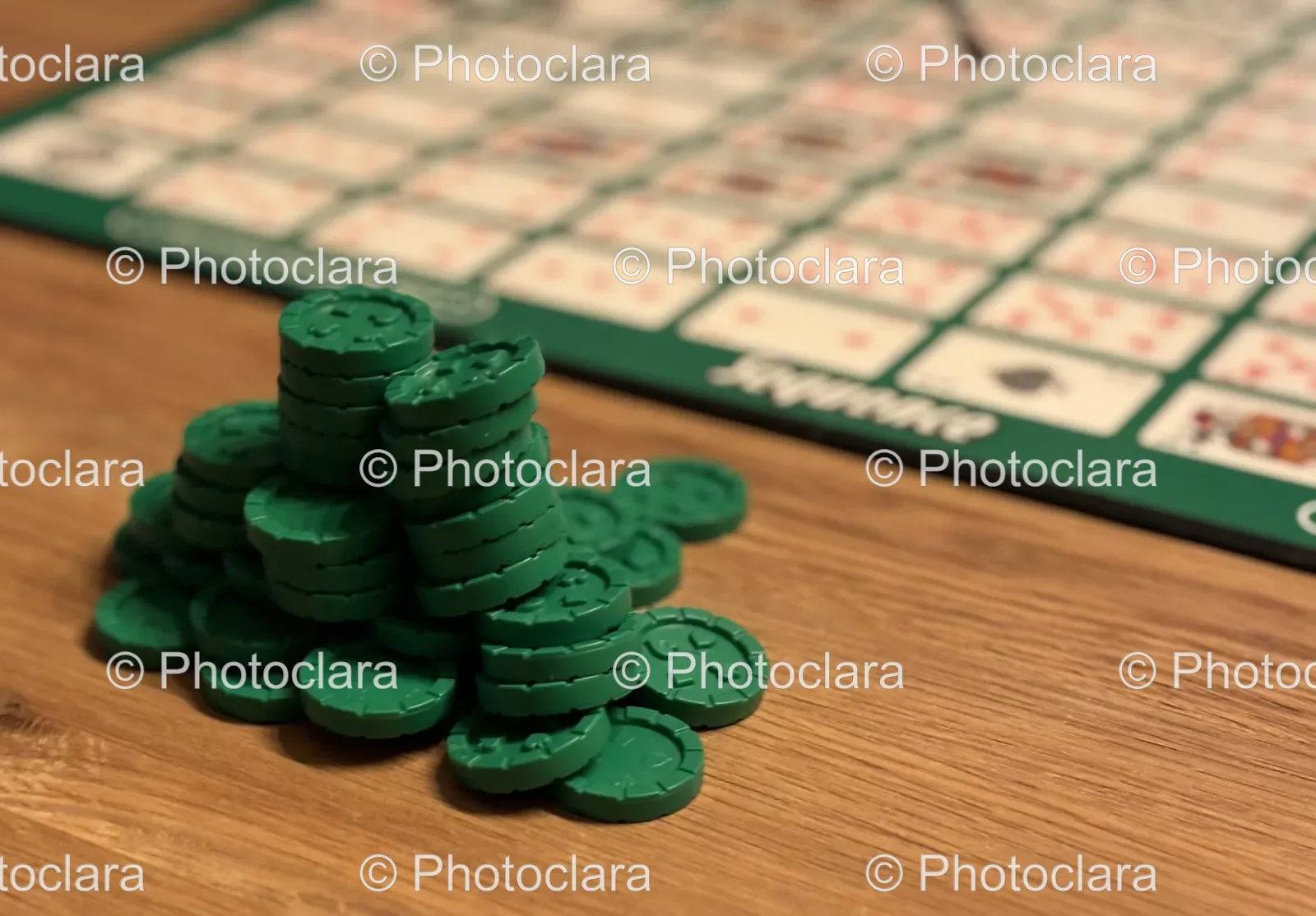 pile-of-green-chips-on-table.jpg