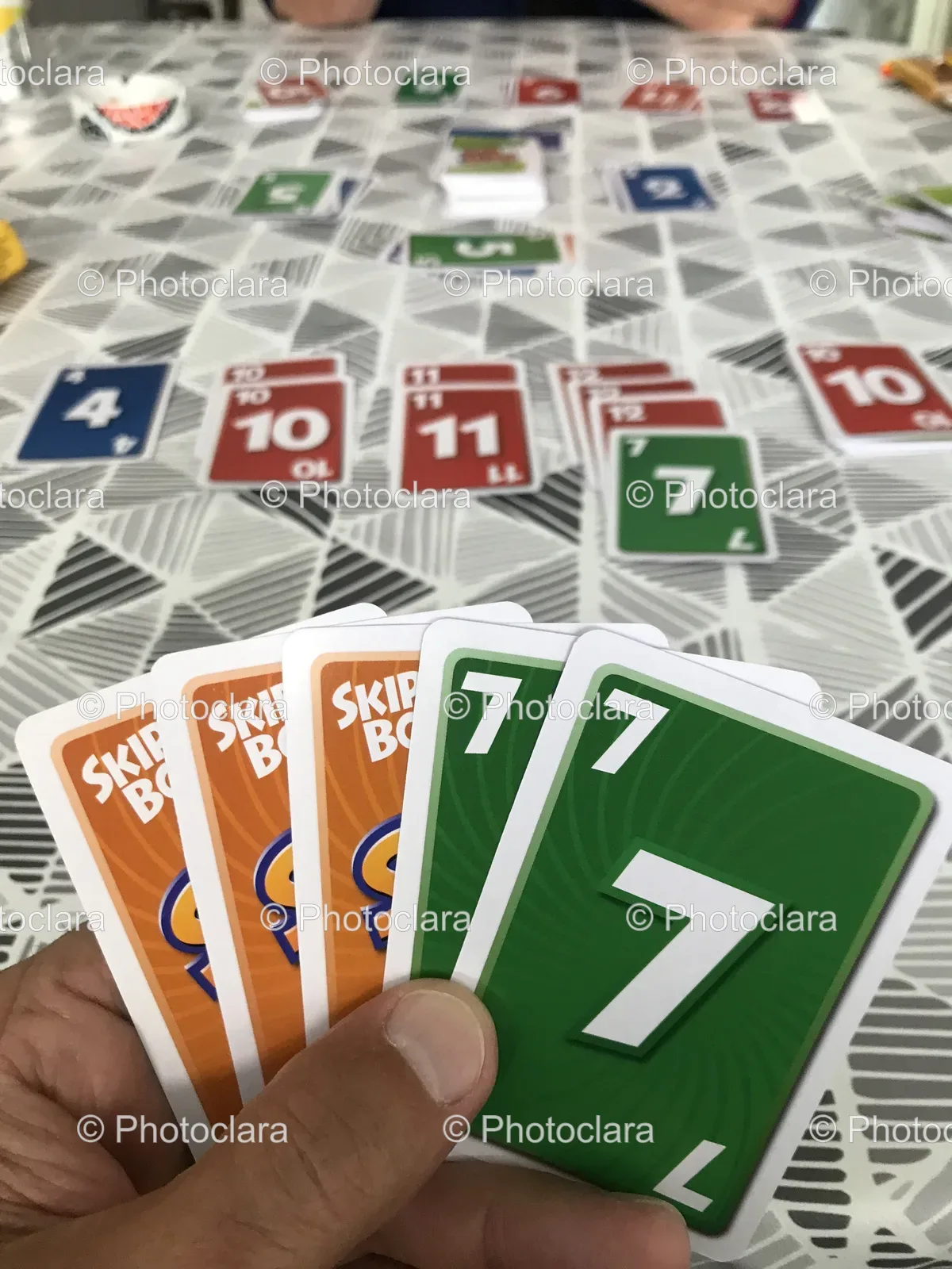 Hand-Holding-a-Card-Game.jpg