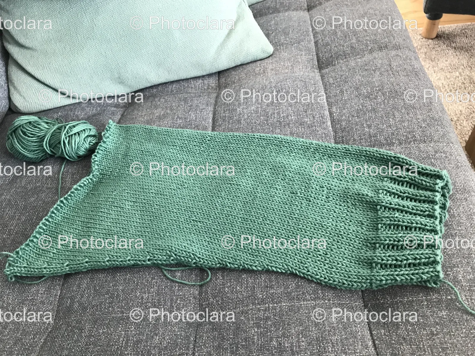 Green-Knitted-Scarf-Grey-Couch.jpg