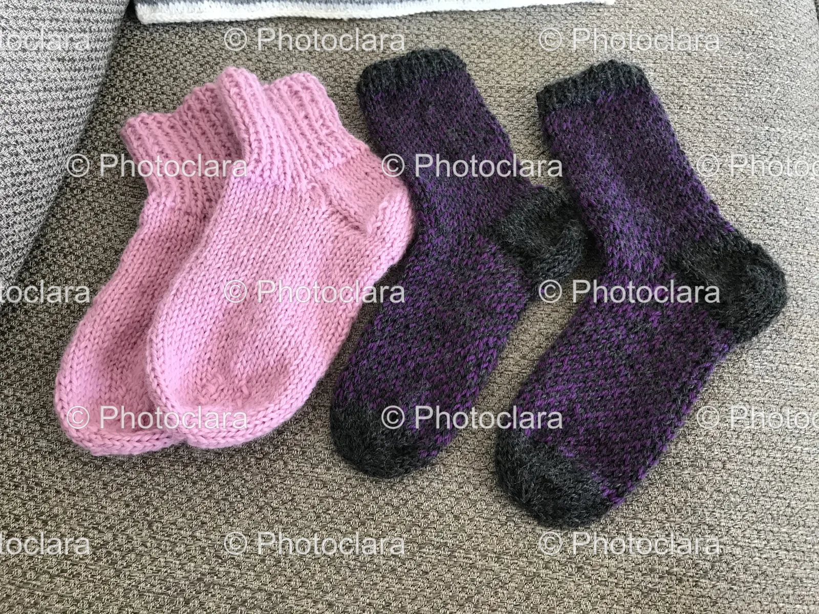group-of-colorful-knitted-socks-on-a-carpet.jpg