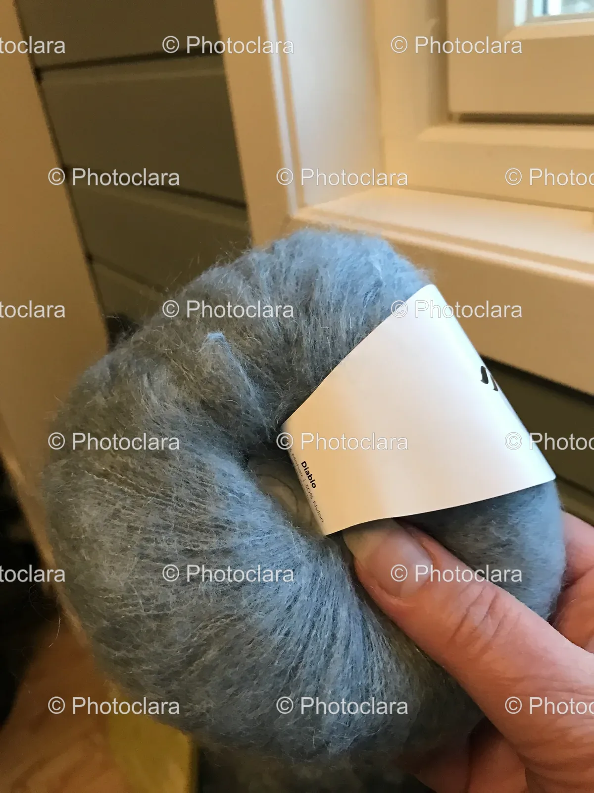Hand-Holding-Grey-Yarn.jpg