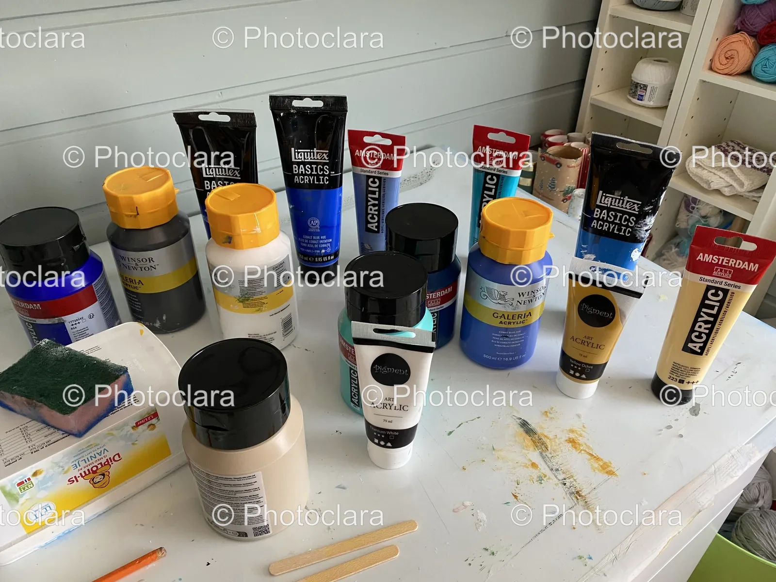 a-group-of-paint-tubes-on-table.jpg