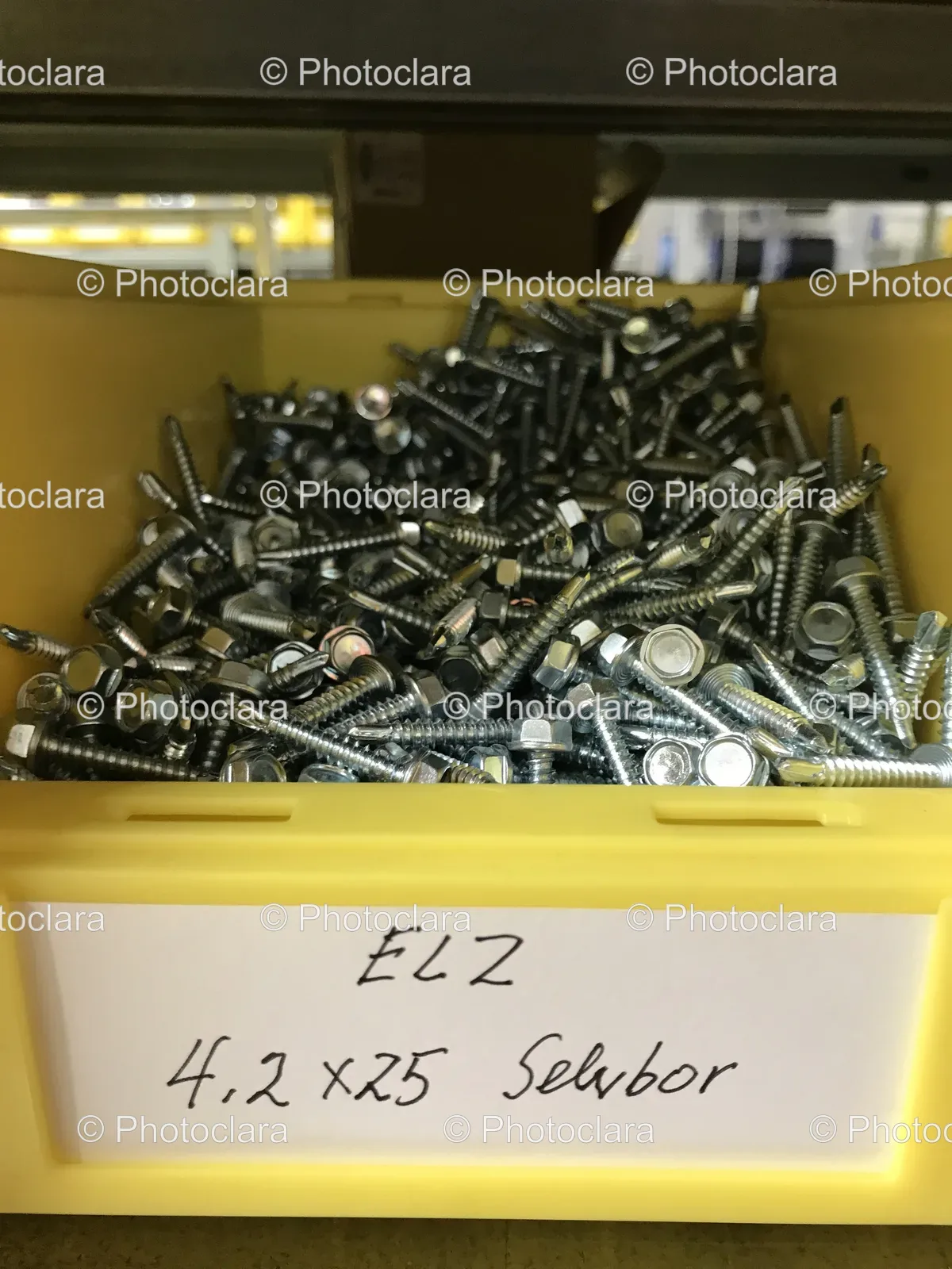 yellow-bin-full-of-screws.jpg