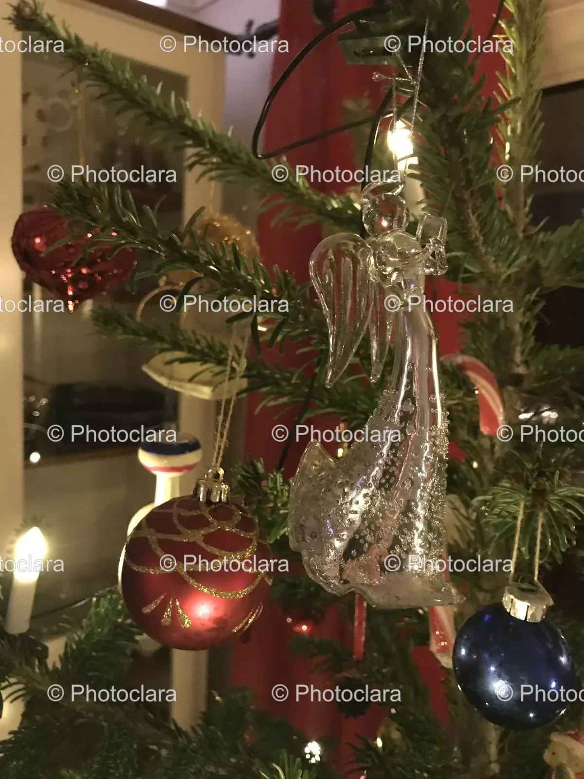 Glass-Angel-Ornament-on-Christmas-Tree.jpg