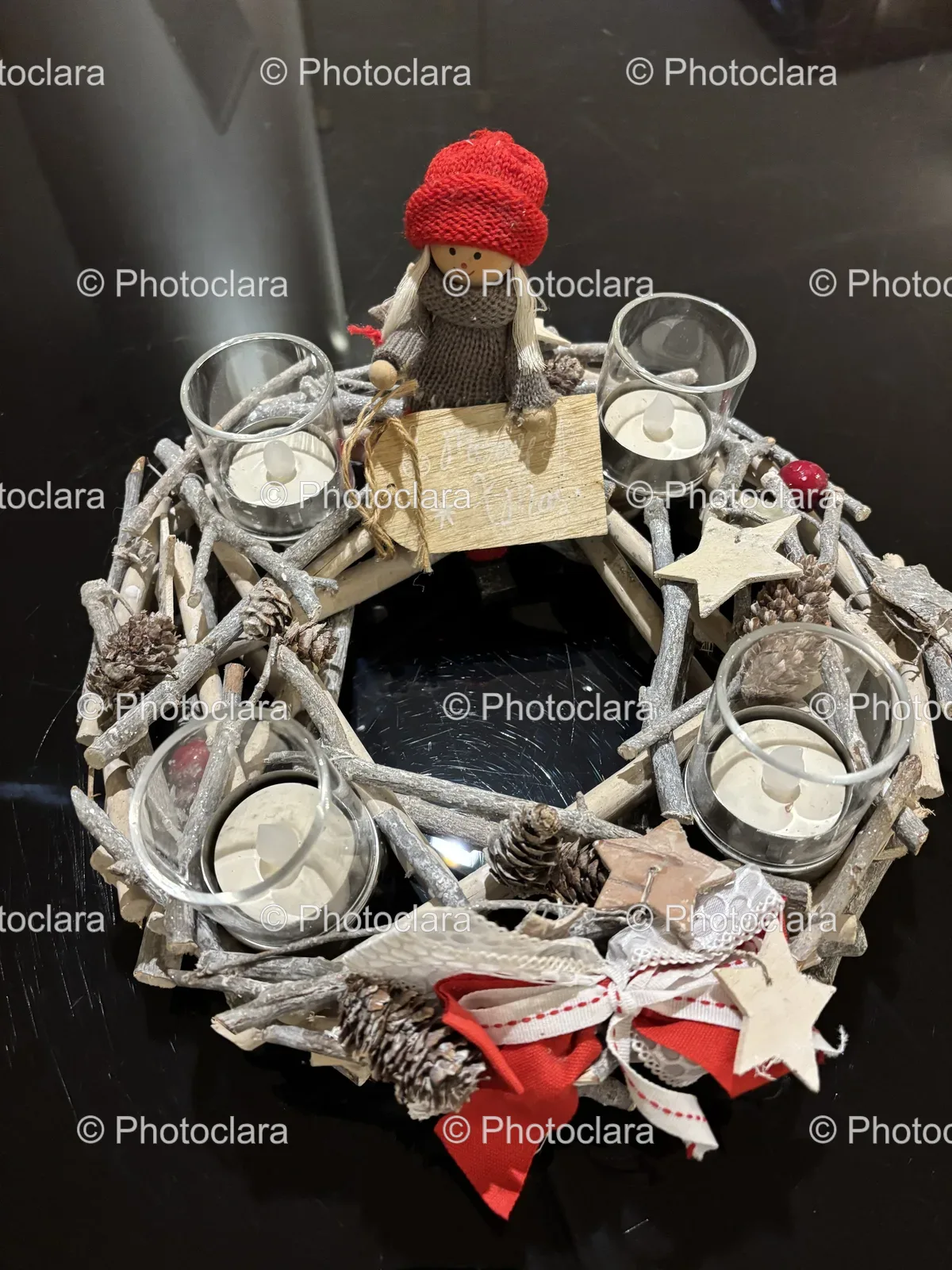 Charming-Festive-Wreath-with-Doll-and-Candles.jpg