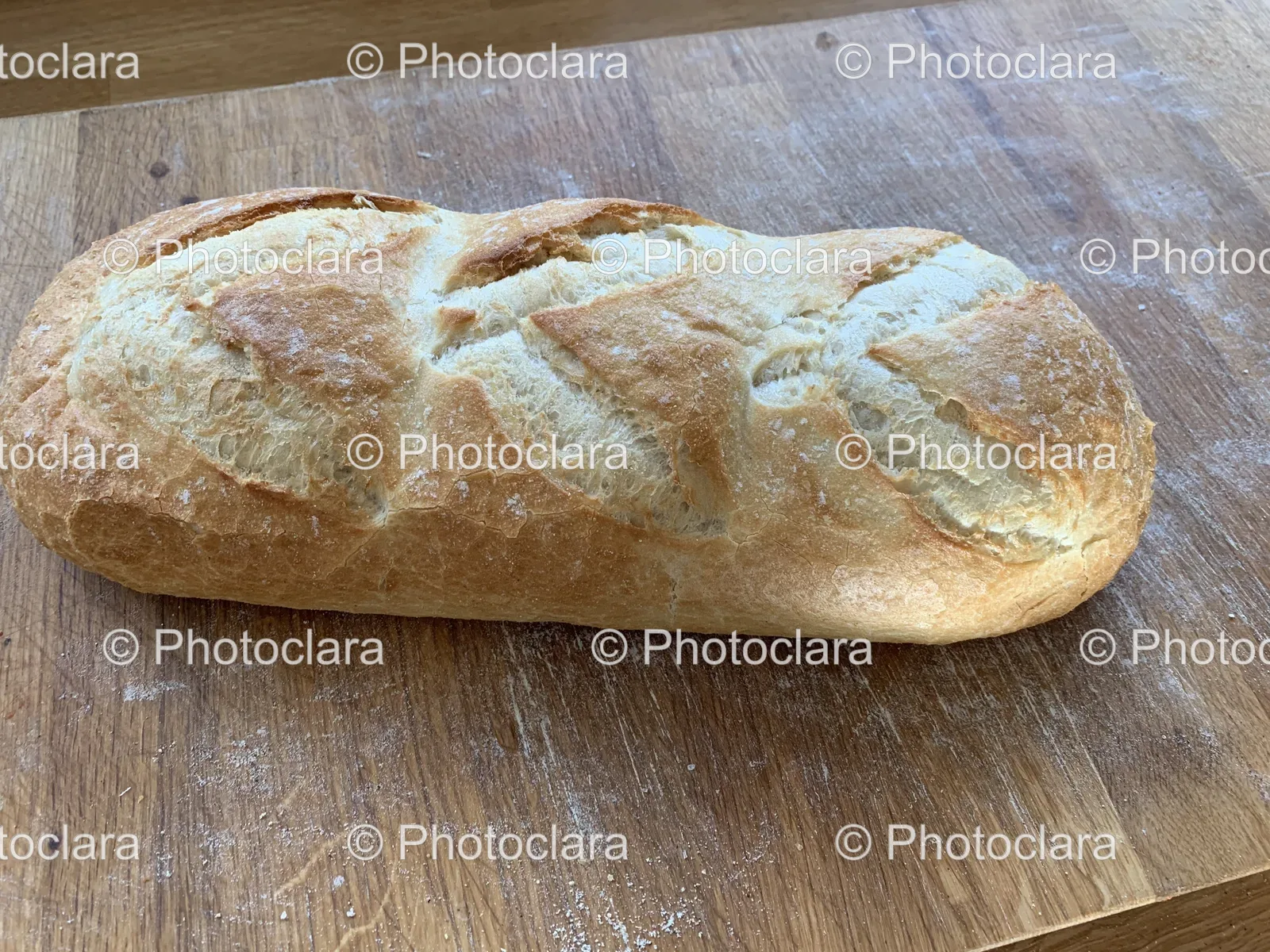 rustic-loaf-of-bread-on-wooden-surface.jpg