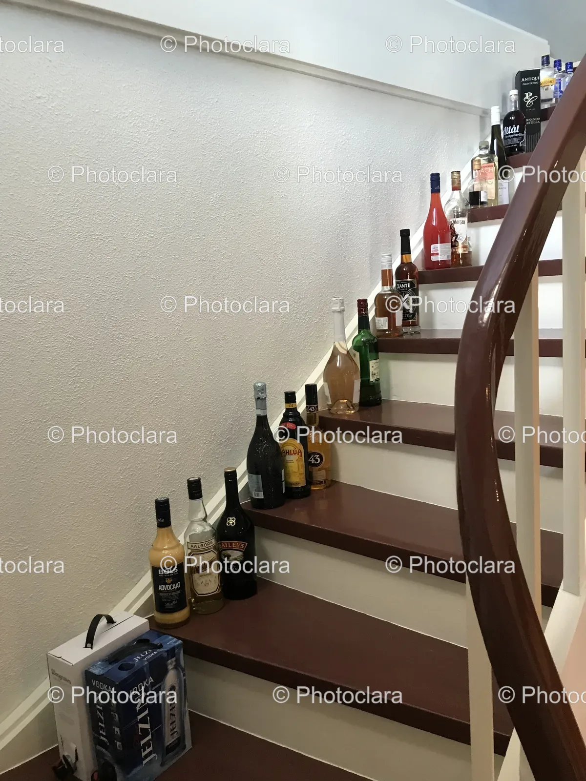 Antique-Staircase-with-Assorted-Bottles-of-Alcohol.jpg