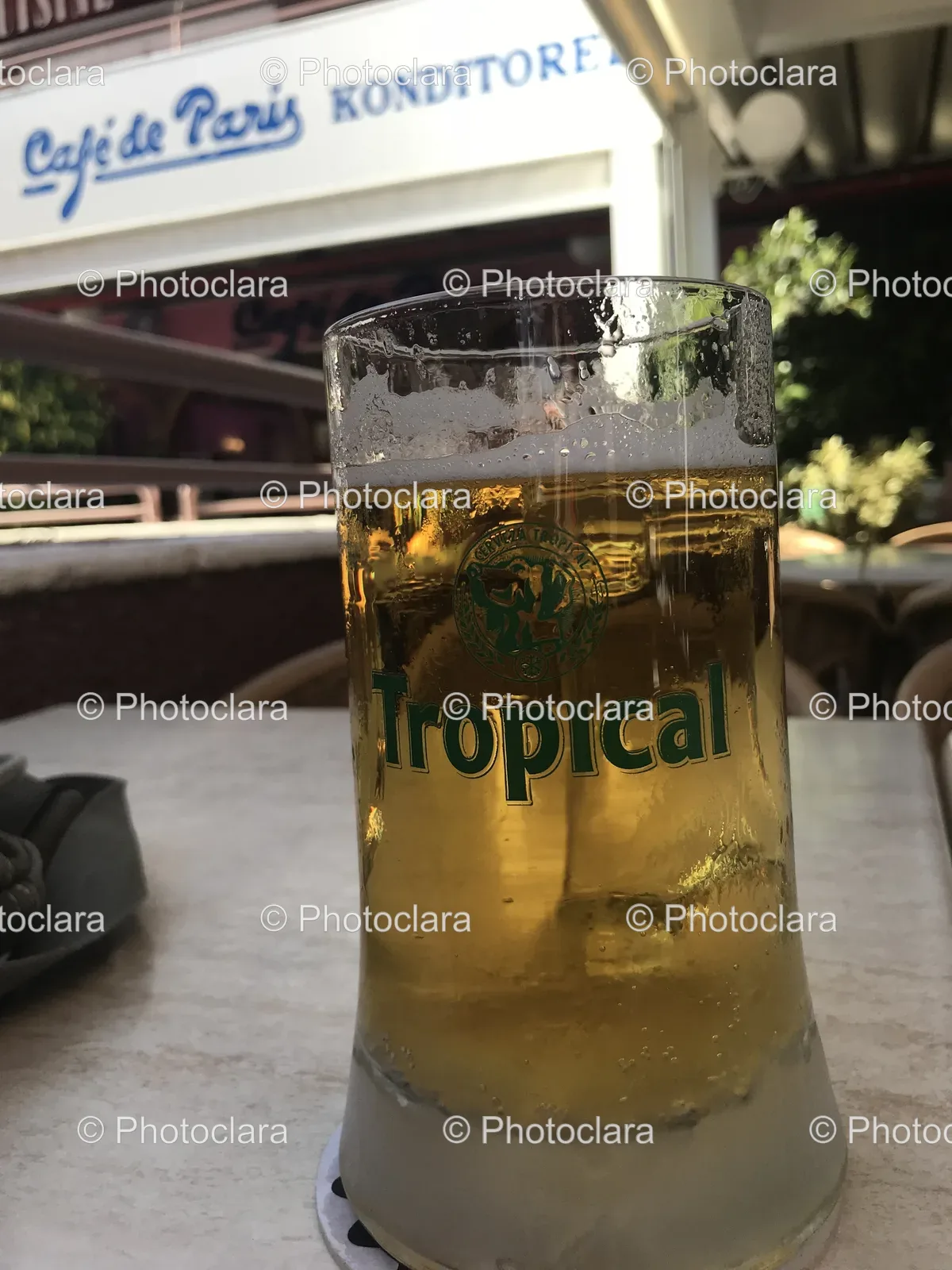 enjoying-a-glass-of-beer-at-cafe-de-paris.jpg