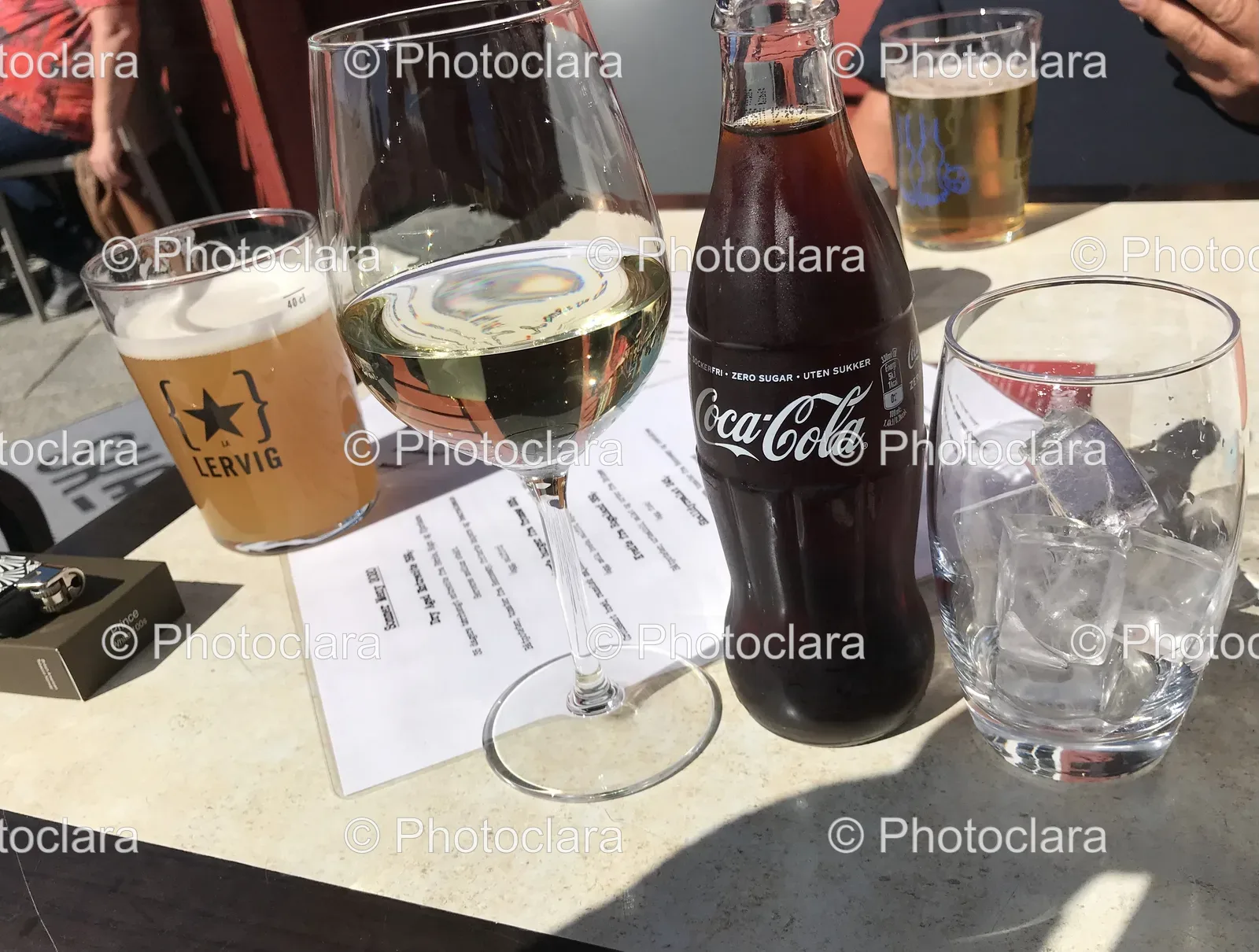Glass-and-Bottle-of-Beverage-on-a-Table.jpg