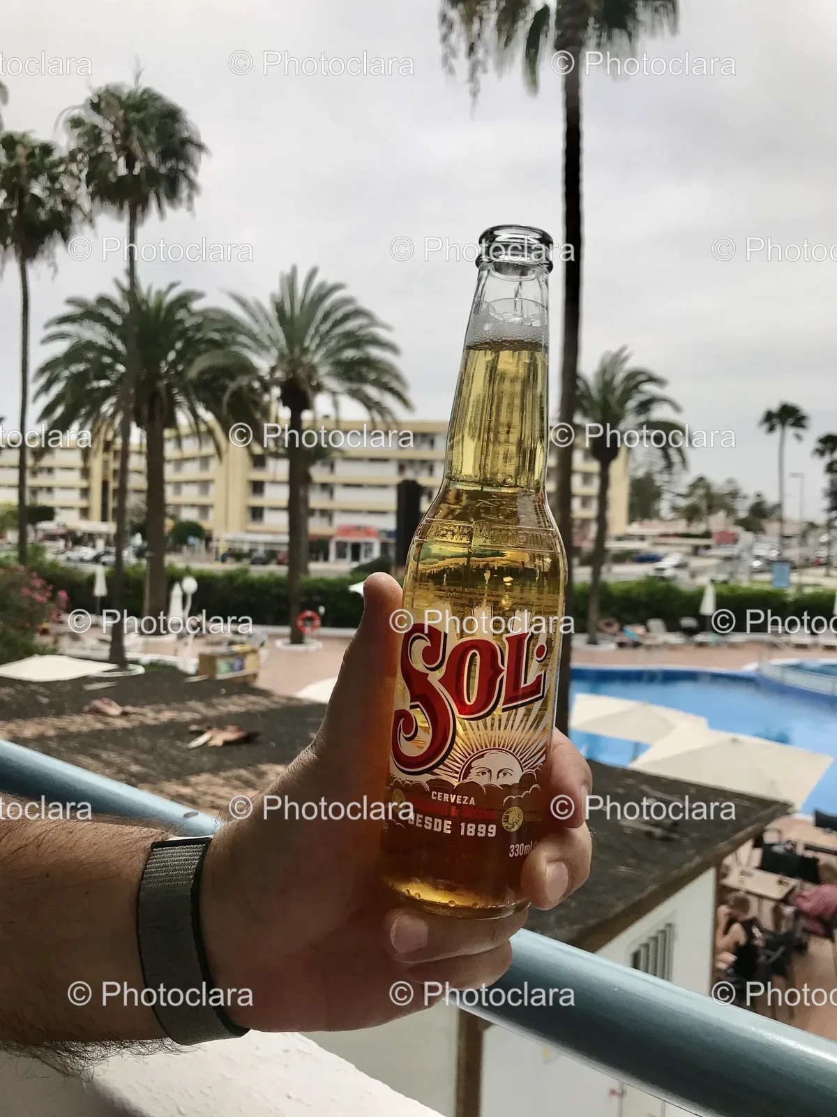 Hand-Holding-Sol-Beer-Bottle.jpg