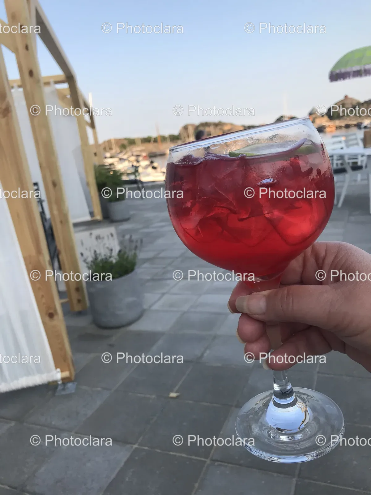 Hand-Holding-Glass-Red-Cocktail.jpg