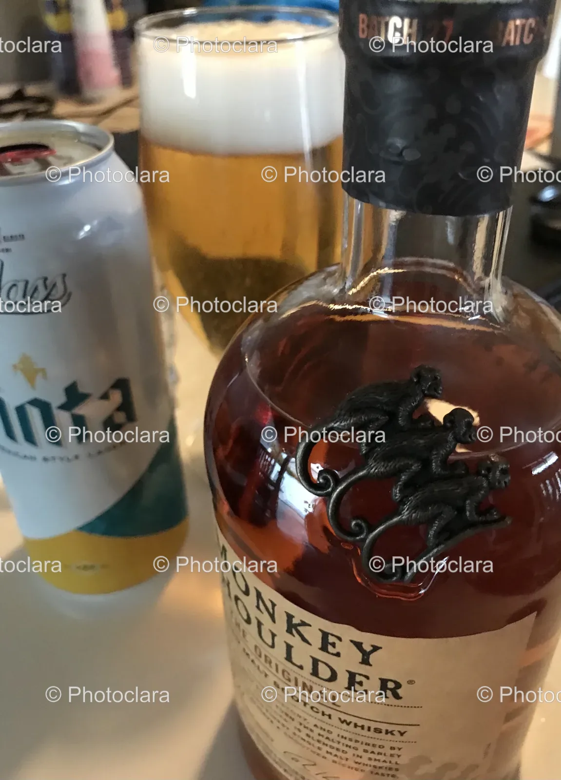 Bottle-of-Alcohol-Next-to-Can-of-Beer.jpg