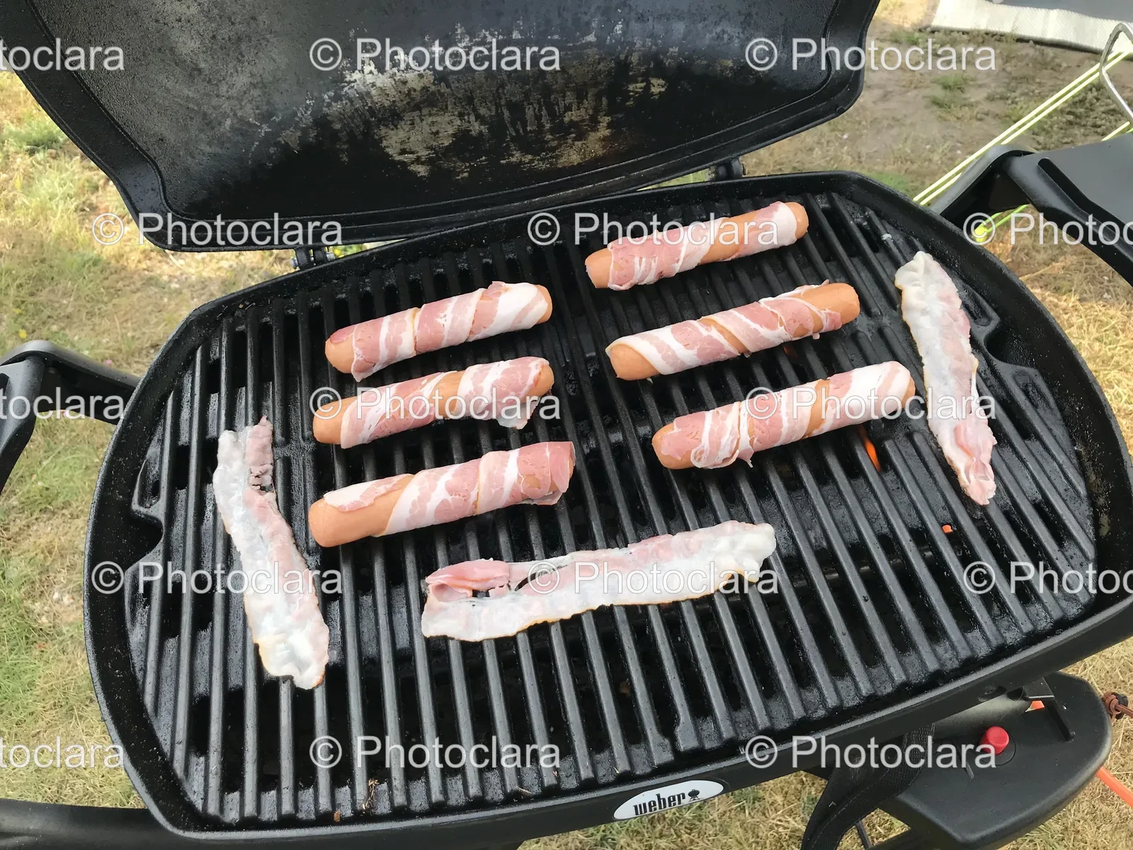 Bacon-Wrapped-Hot-Dogs-on-a-Grill.jpg