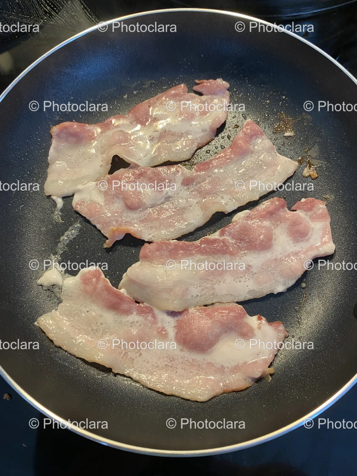 crispy-bacon-frying.jpg