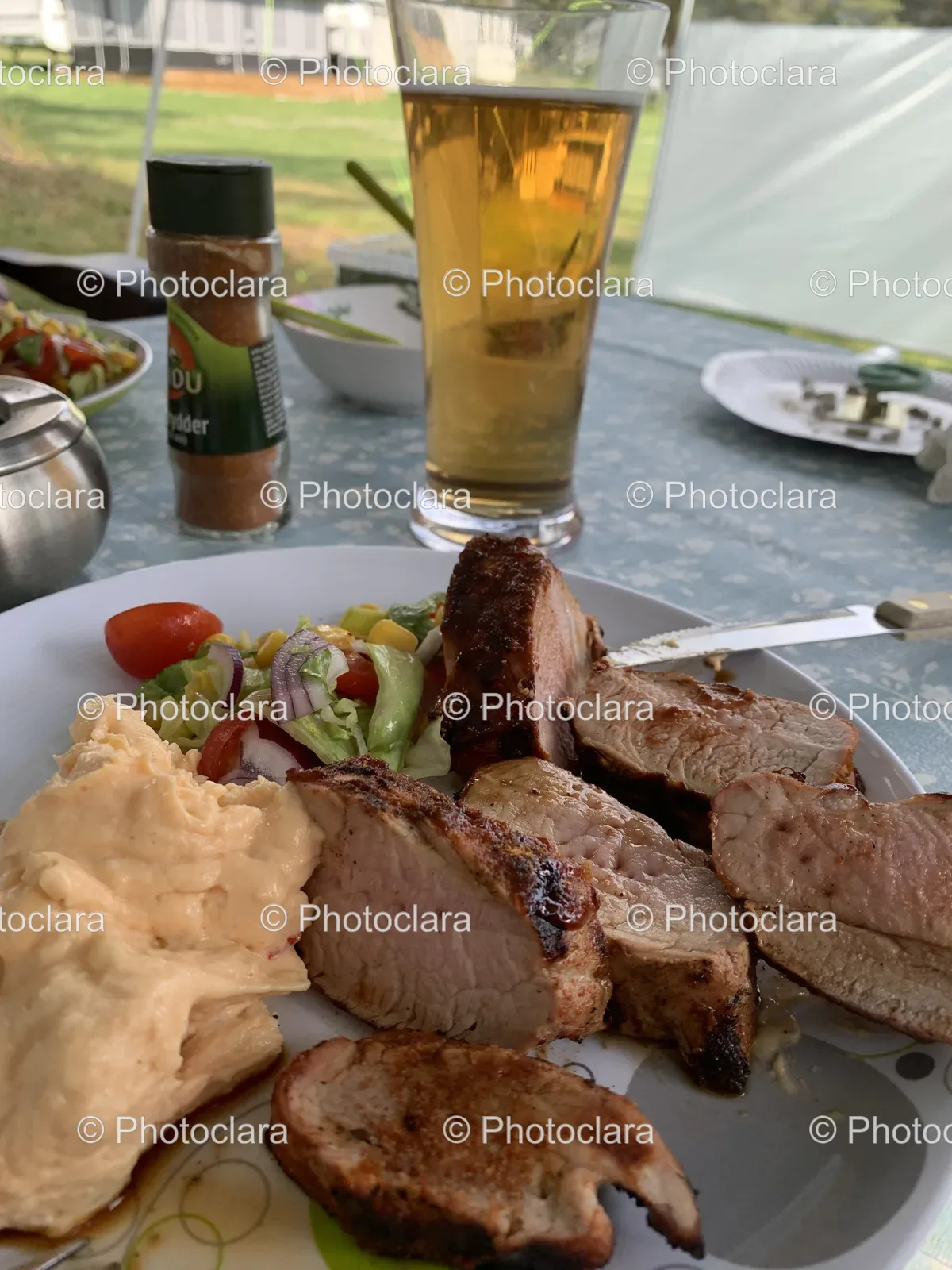 plate-of-meat-and-salad-on-table.jpg