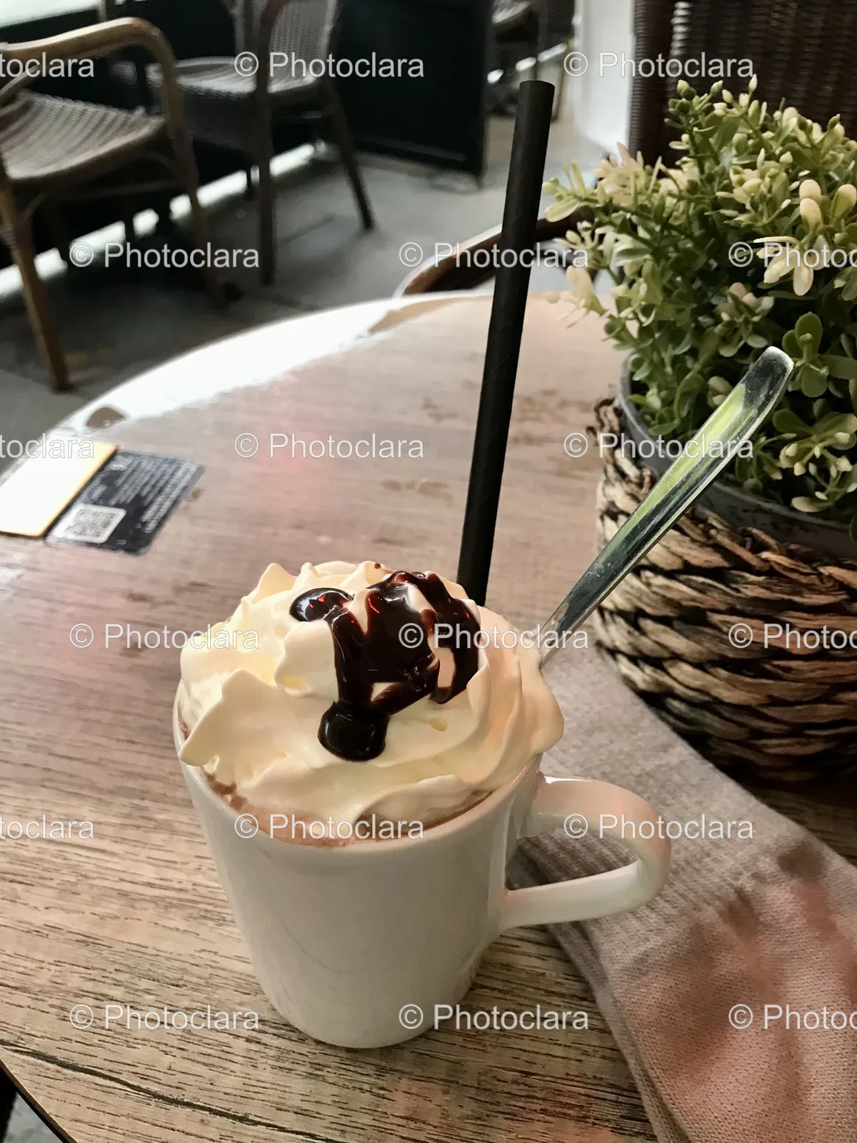 Cup-of-Hot-Chocolate-with-Whipped-Cream-and-Chocolate-Syrup.jpg